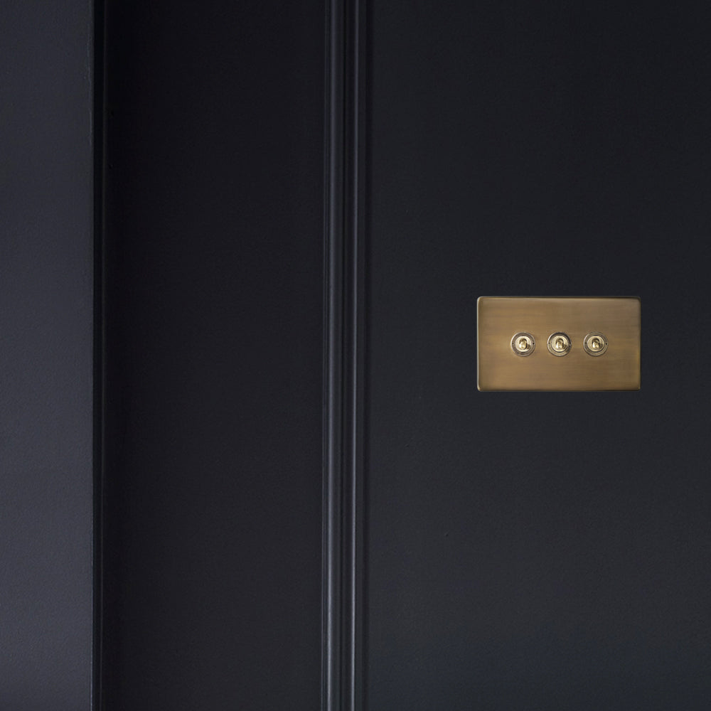 Three gang 2 way Florence toggle switch in brass
