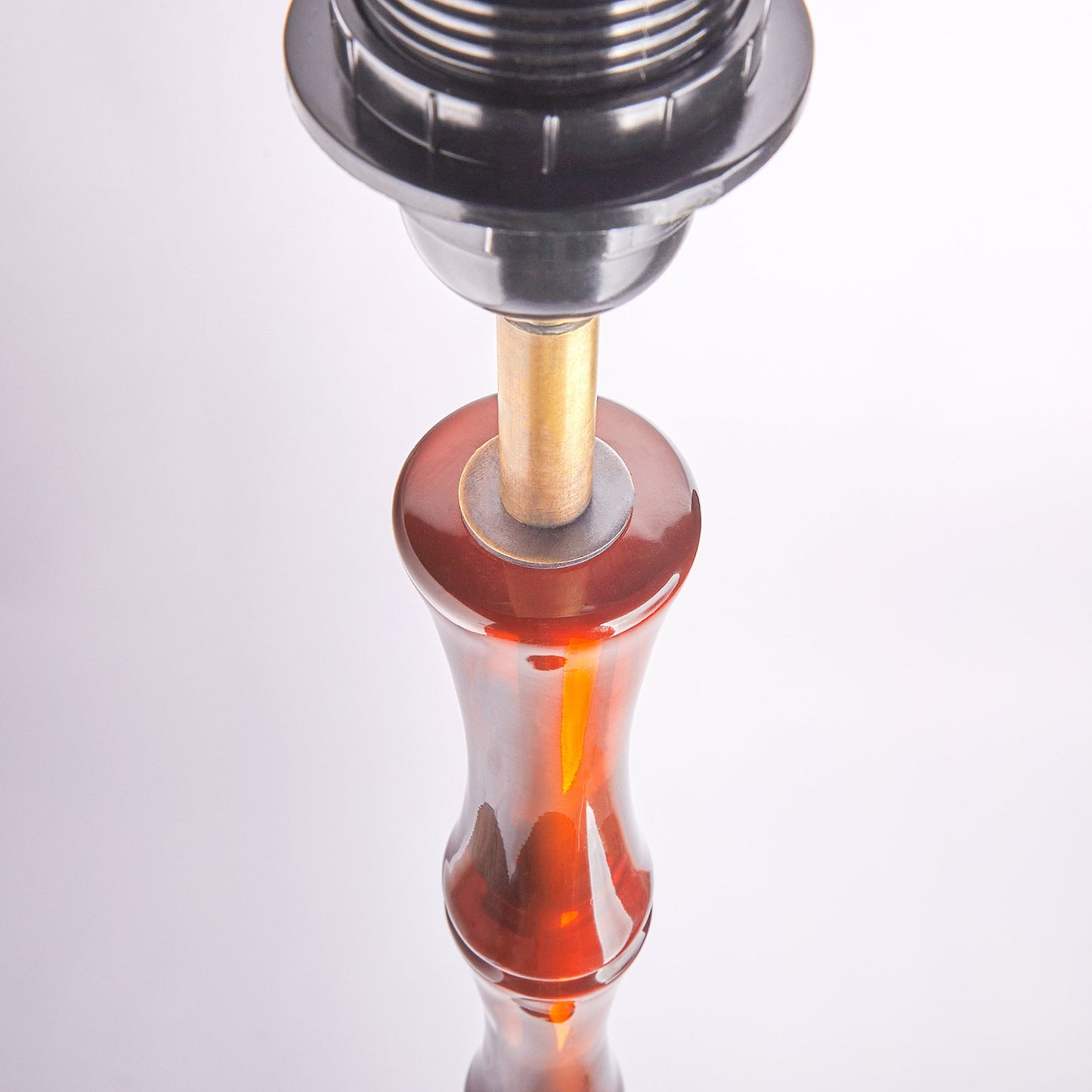 Bamboo floor lamp in amber polished resin