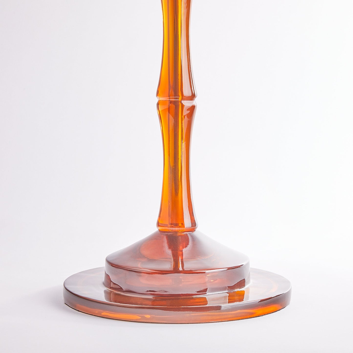 Bamboo floor lamp in amber polished resin