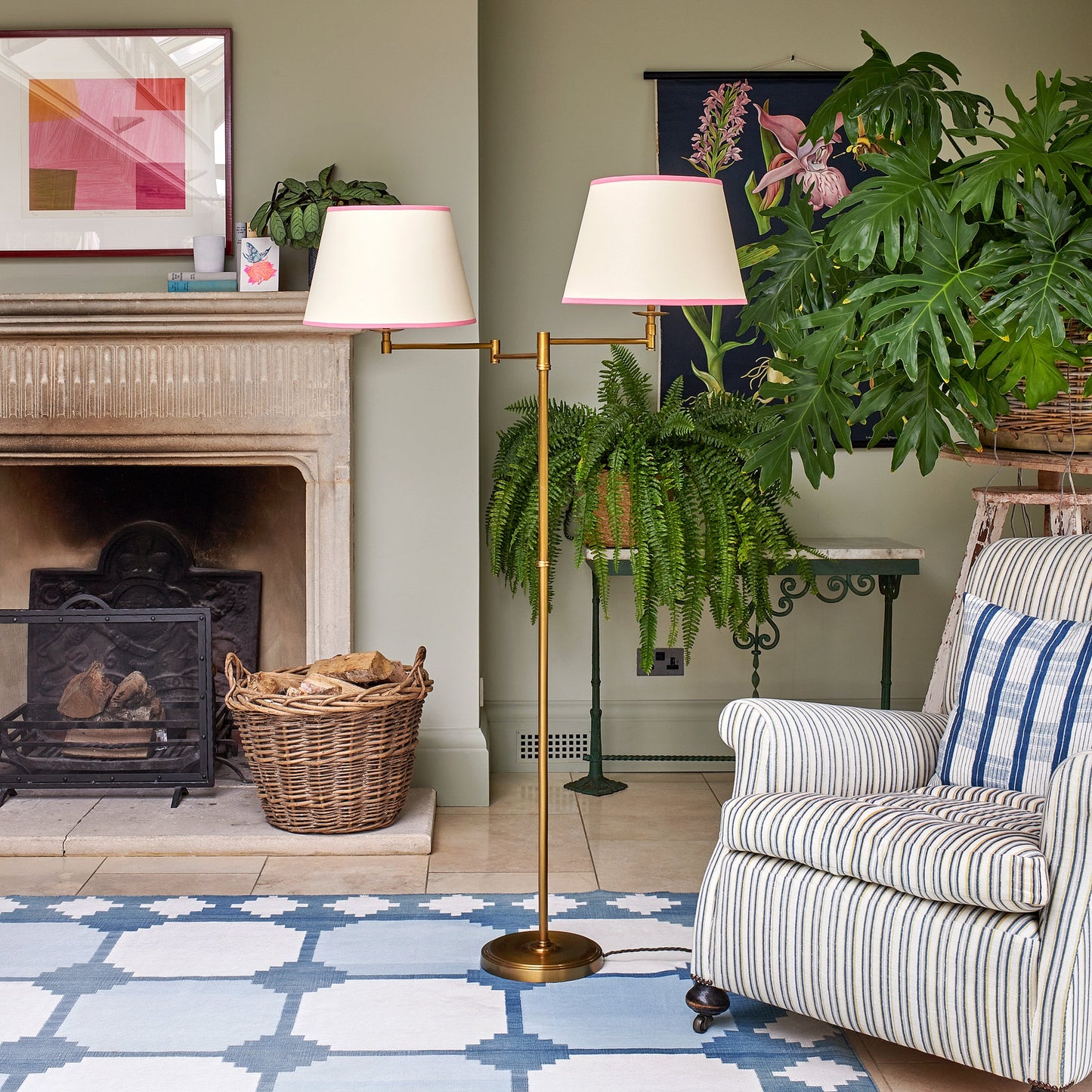 Double Swing standing lamp in antique brass