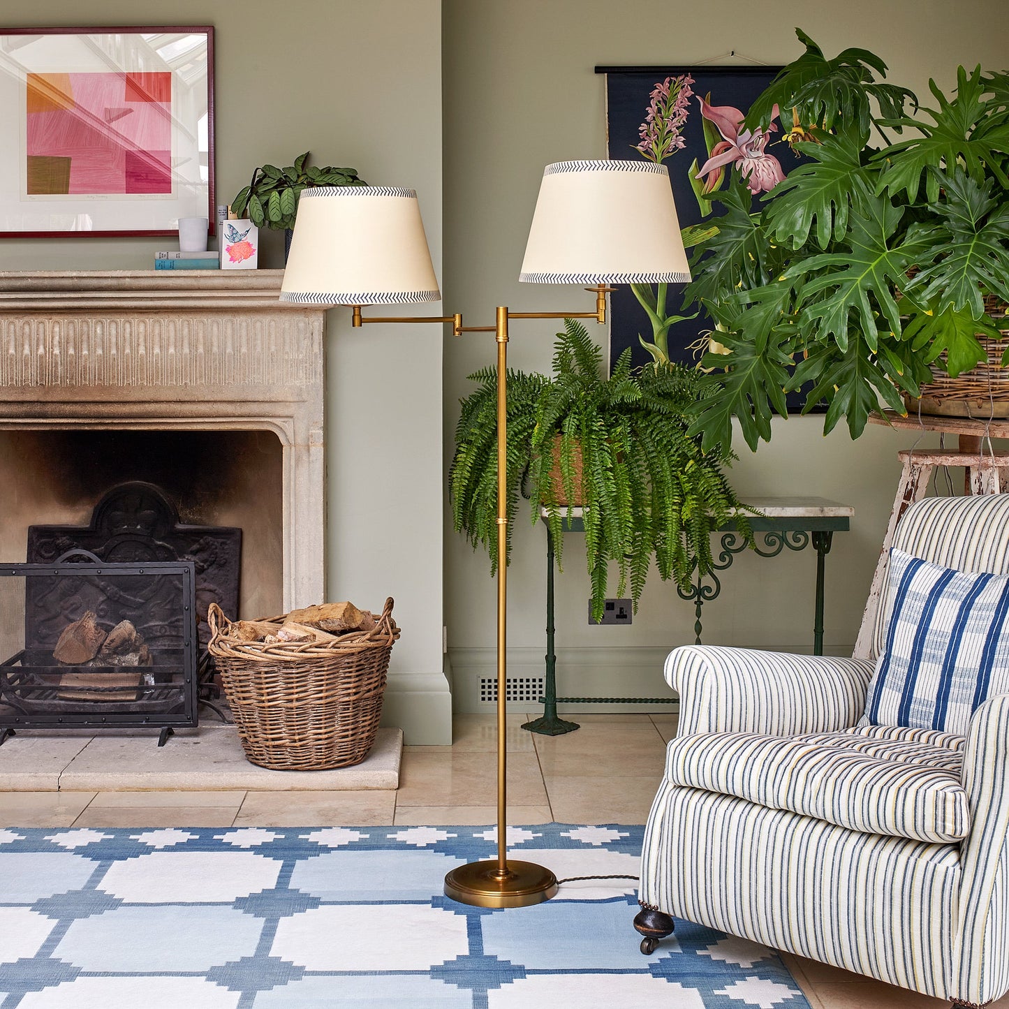 Double Swing standing lamp in antique brass