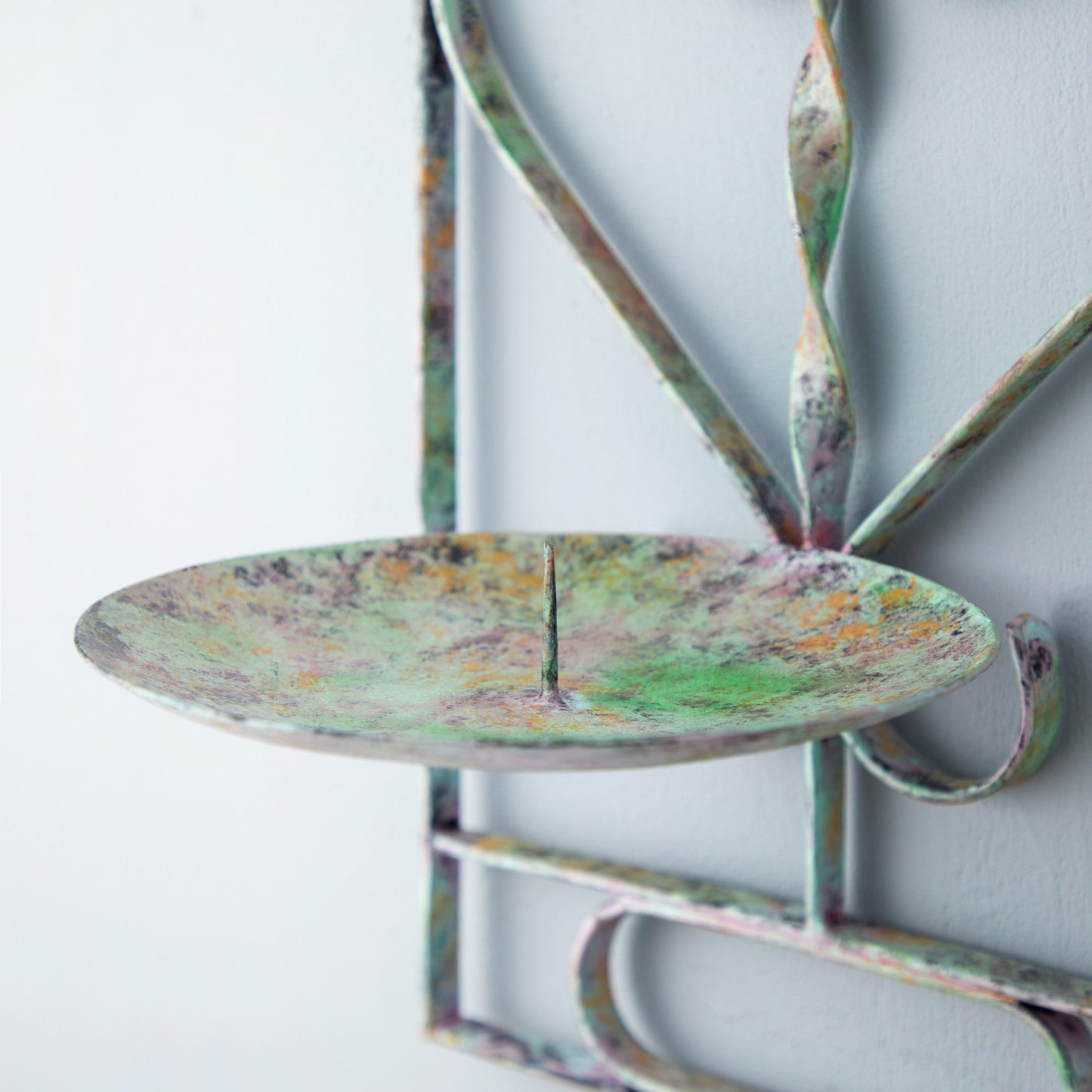 Tor wall mounted candle sconce in verdigris