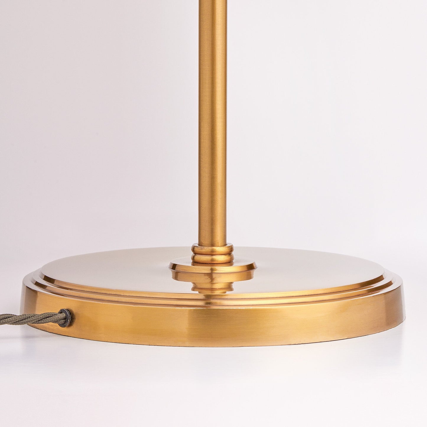 Aesop standing lamp in antiqued brass