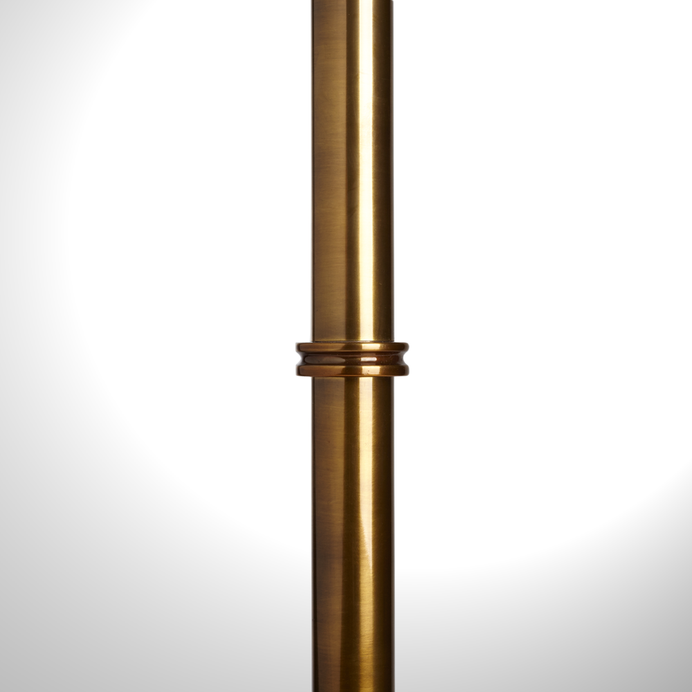 Chukka floor lamp in antiqued brass