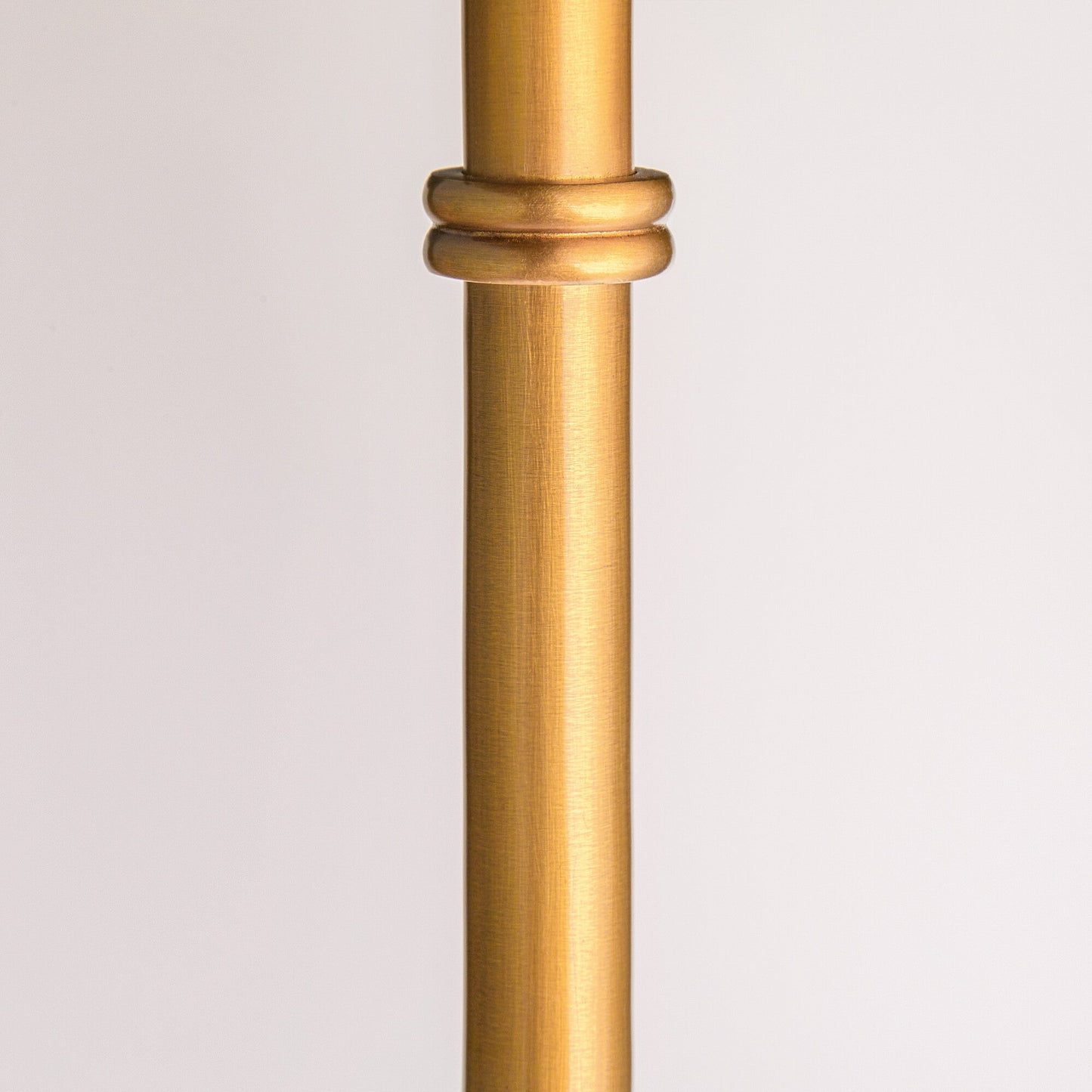 Double Swing standing lamp in antique brass