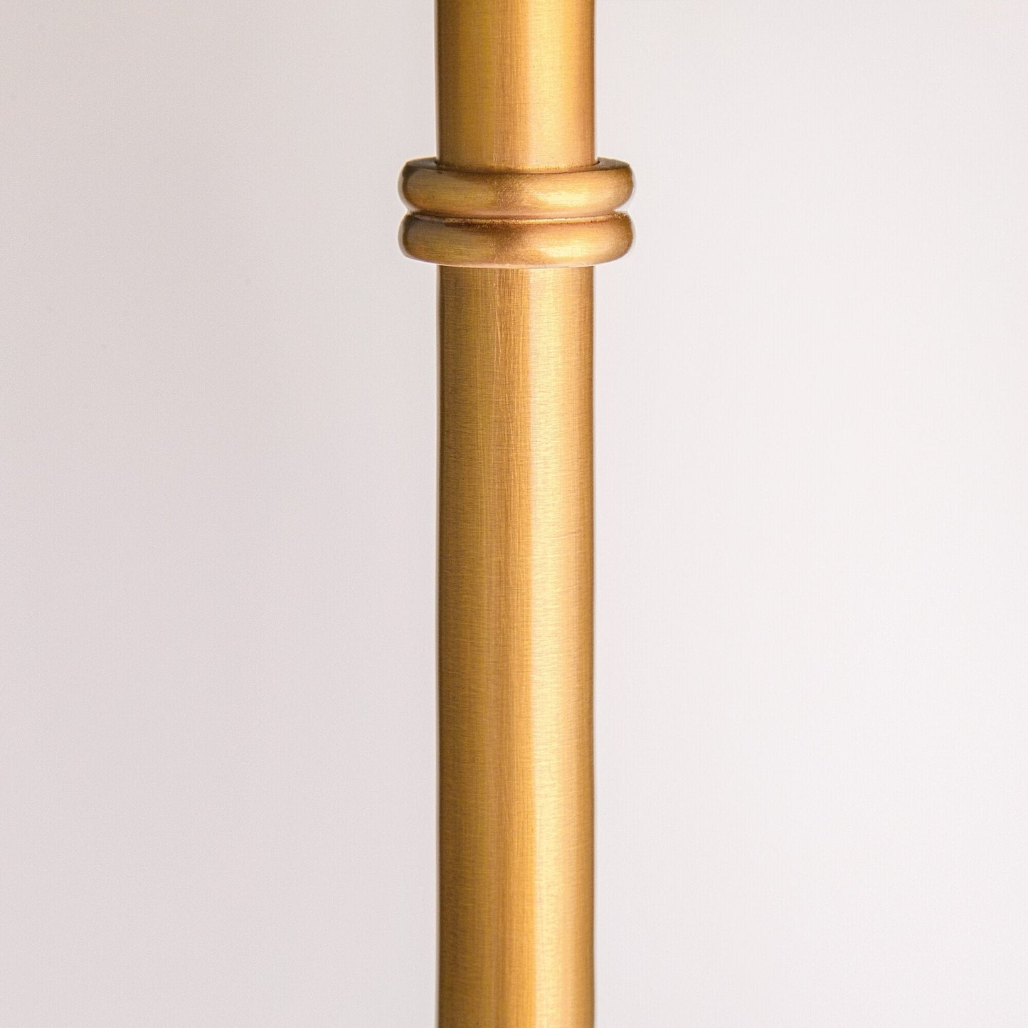 Swing articulated standing lamp in brass