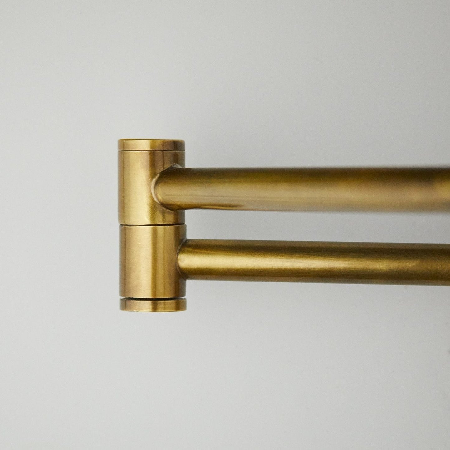 Cagney Wall fitting in antiqued brass