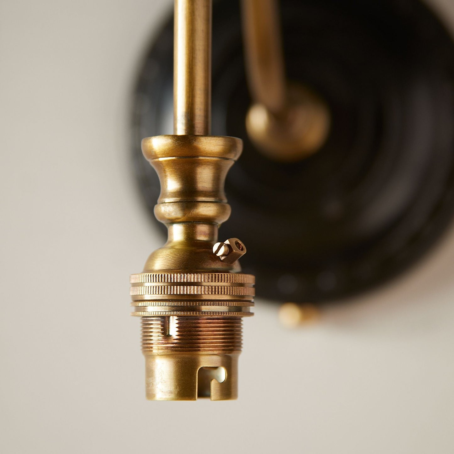 Drake wall fitting in wood and brass
