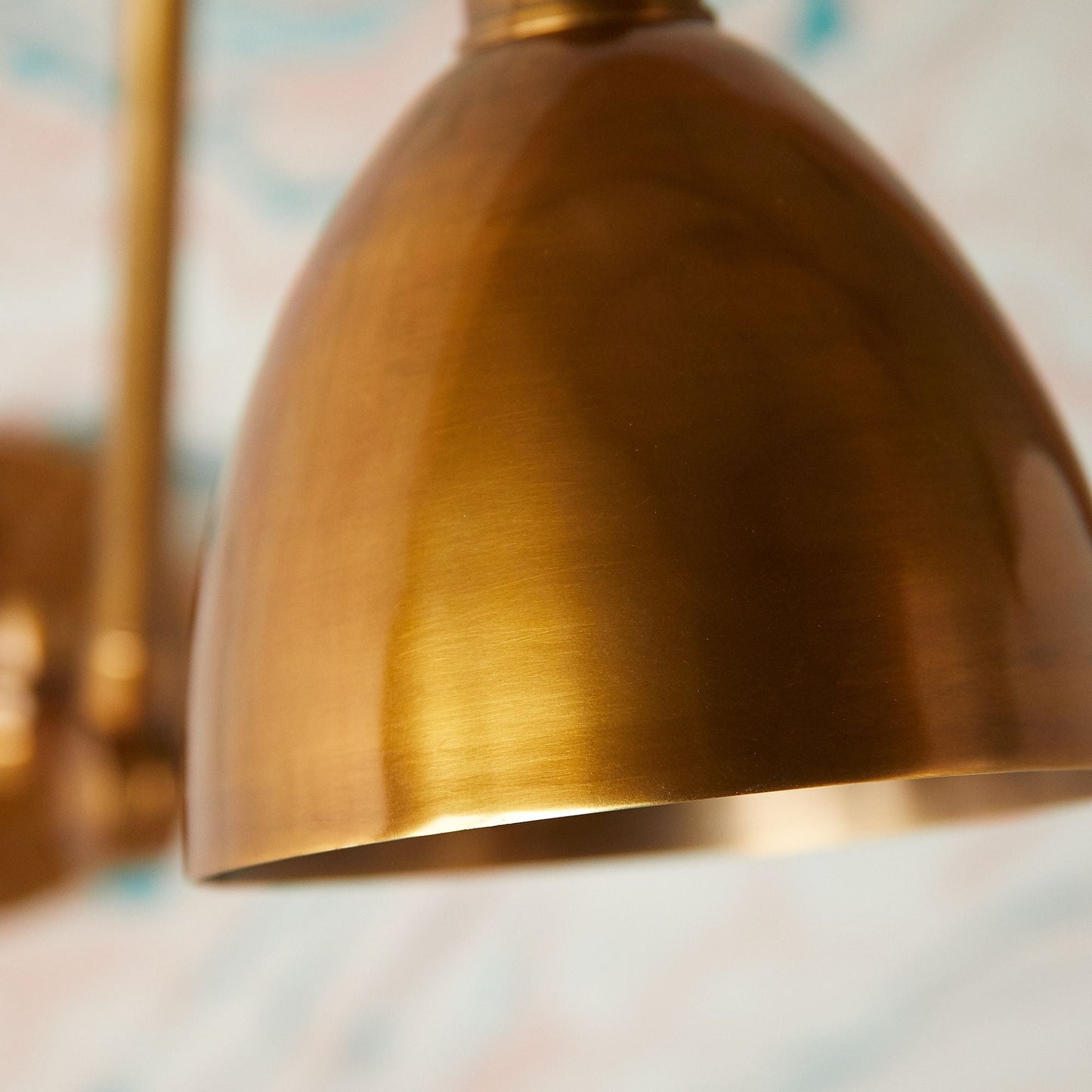 Jasmine Wall Light in Antiqued Brass