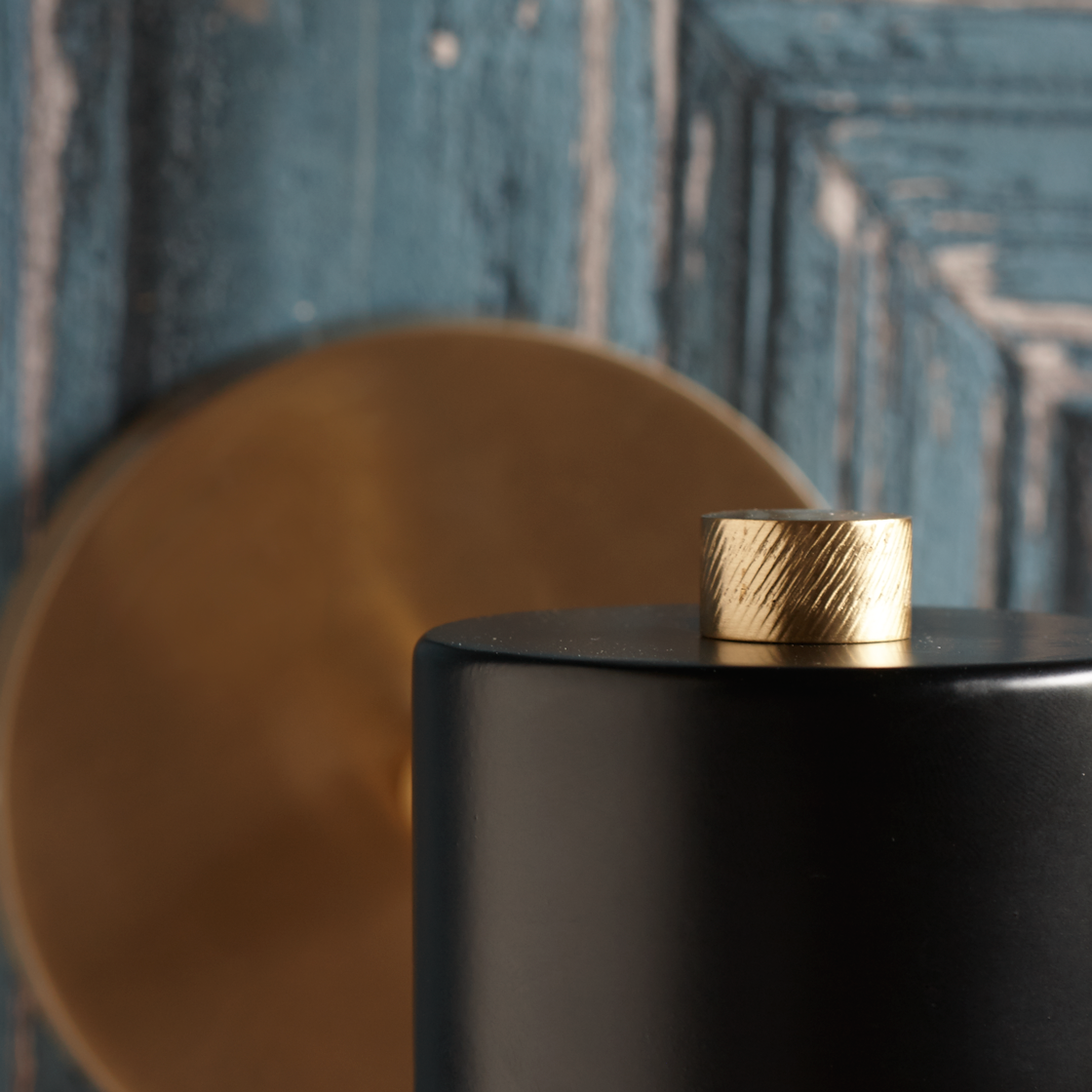 Ursula wall light in brass with a black hood