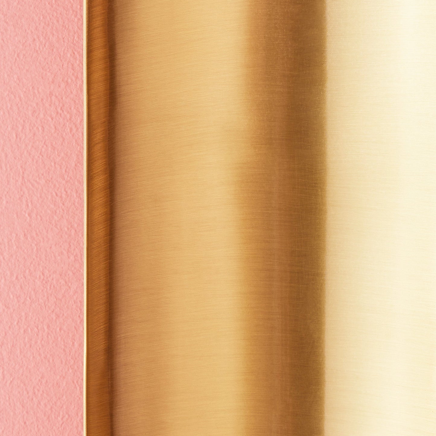 Pitti wall mounted candle holder in antiqued brass