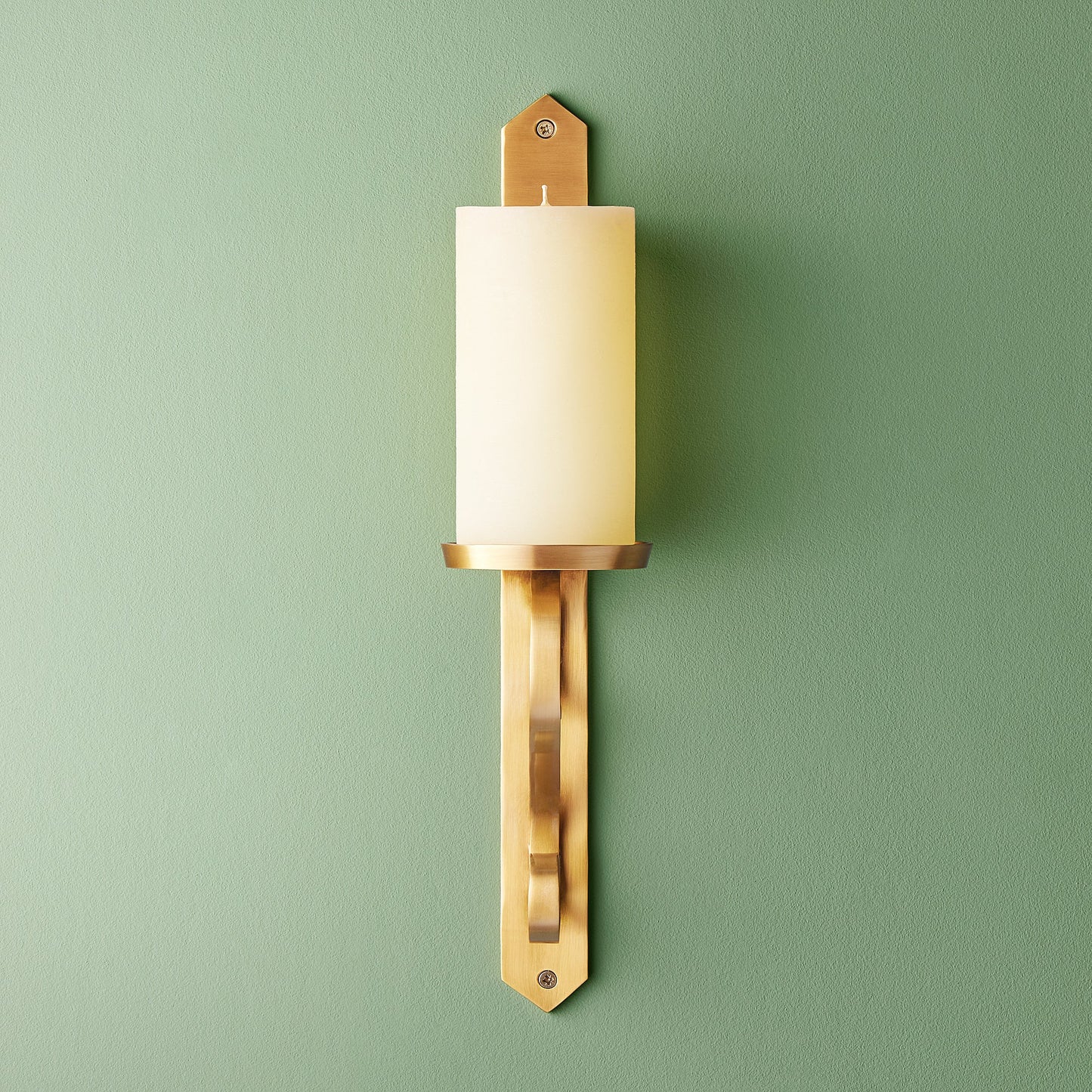 Tivoli wall mounted candle holder in antiqued brass