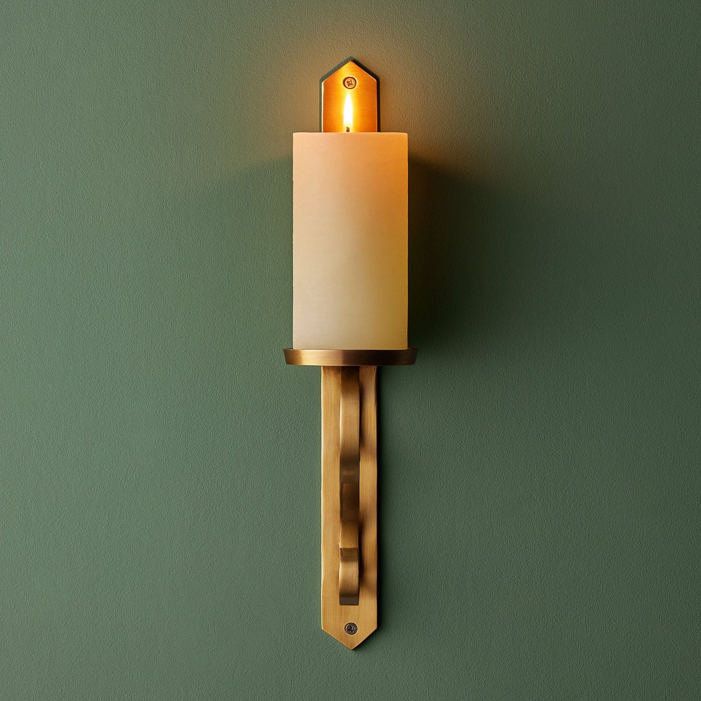 Tivoli wall mounted candle holder in antiqued brass