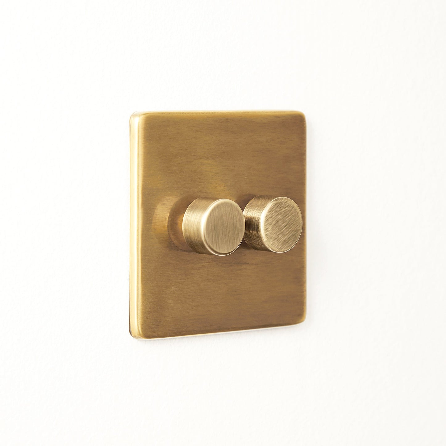 Two gang 2 way Florence dimmer switch in brass