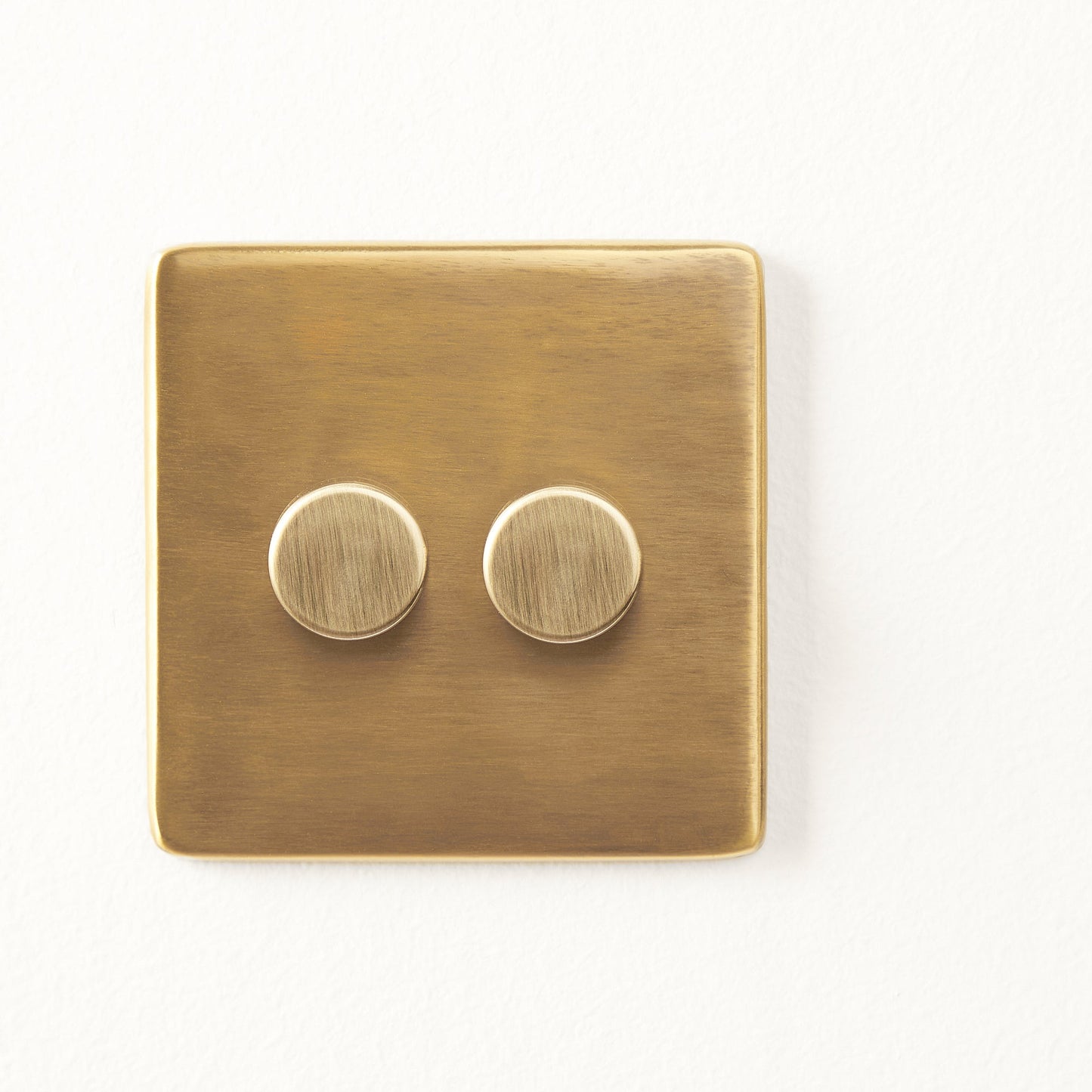 Two gang 2 way Florence dimmer switch in brass