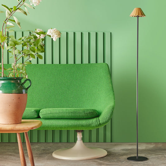 Twinky rechargeable floor lamp in black with a brass hood