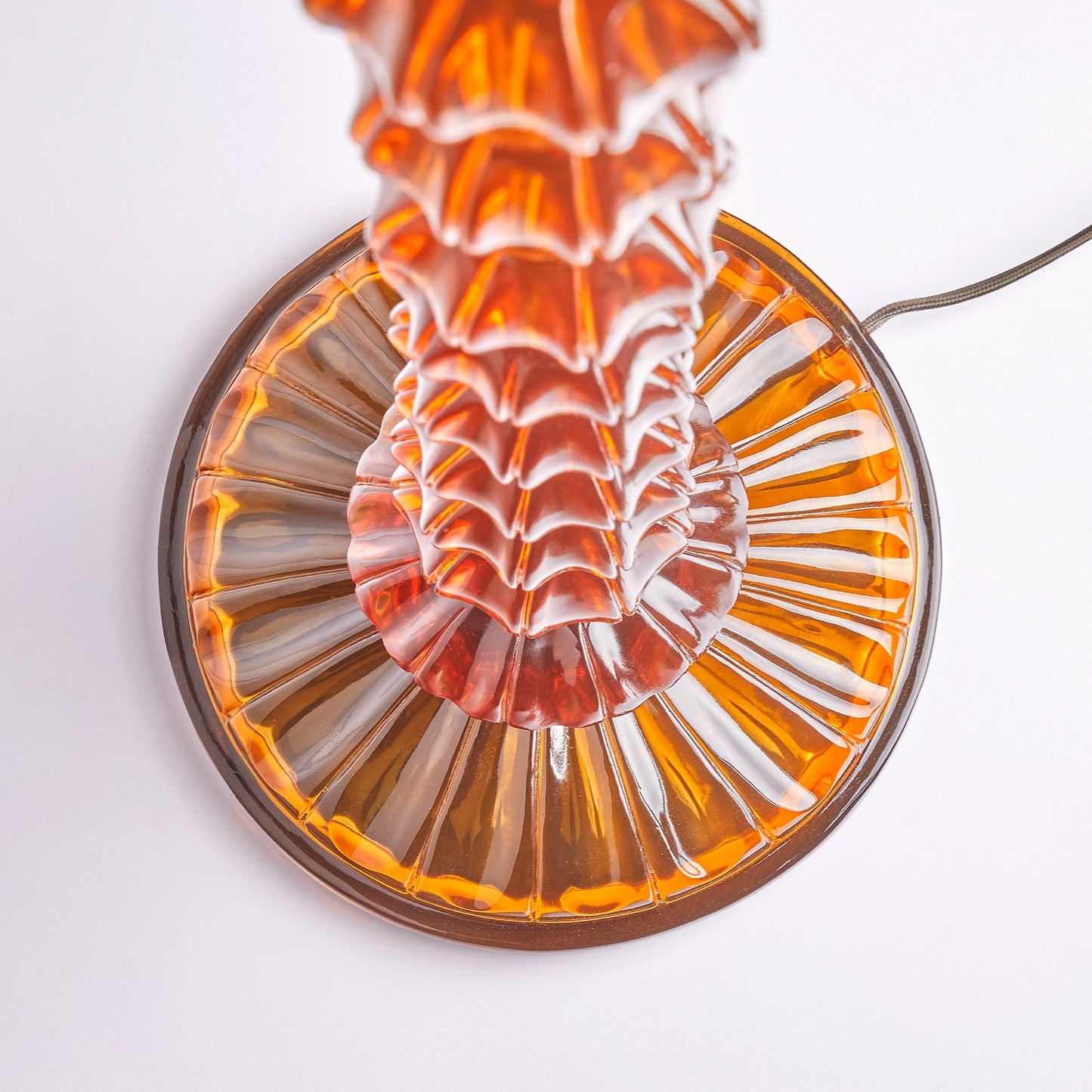 Coronet floor lamp in amber polished resin