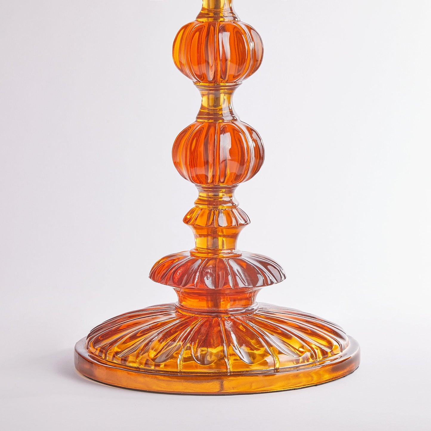 Coronet floor lamp in amber polished resin
