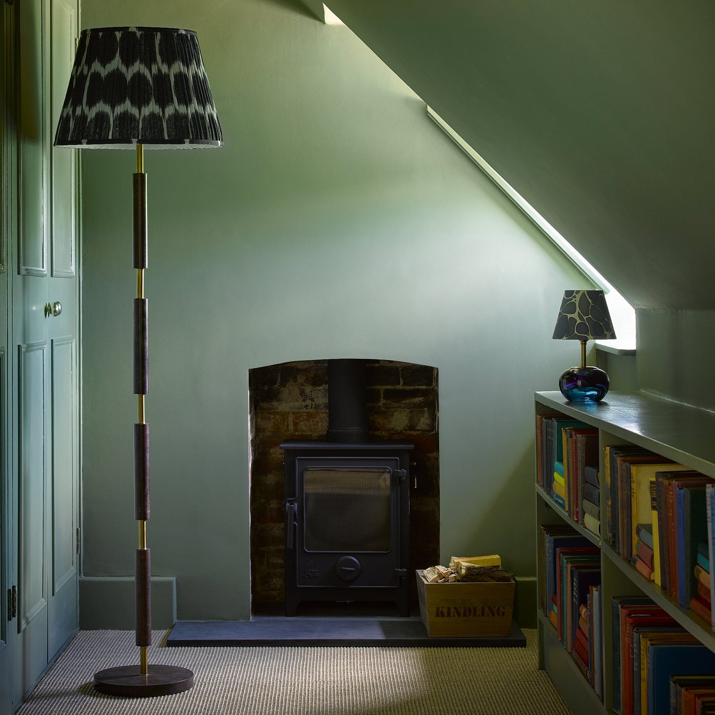 Skellig floor lamp in burnt wood and brass