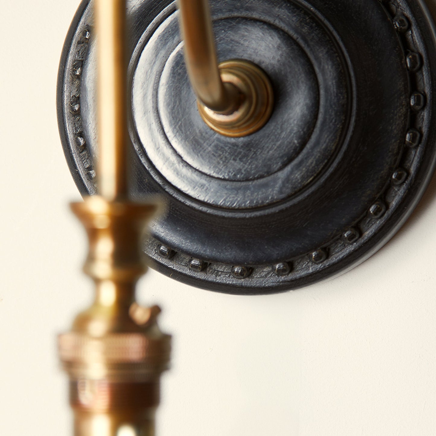 Drake wall fitting in wood and brass