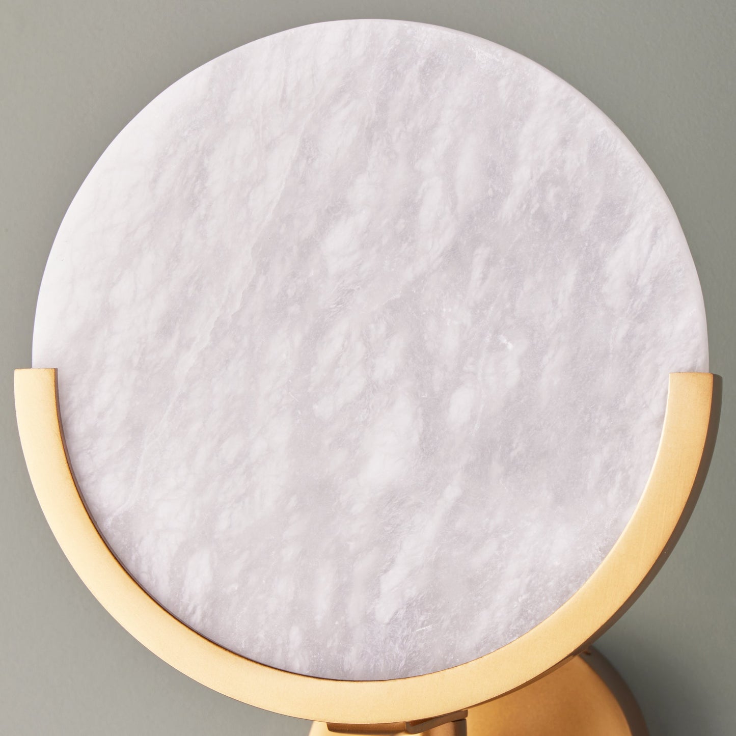 Firefly wall light in antique brass with an alabaster globe