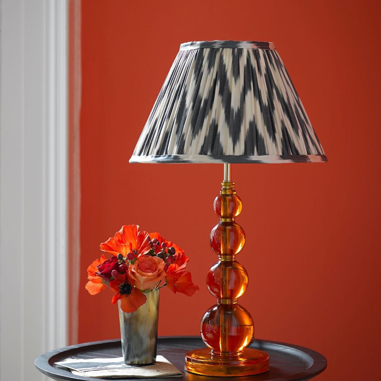 Aurora table lamp in orange resin