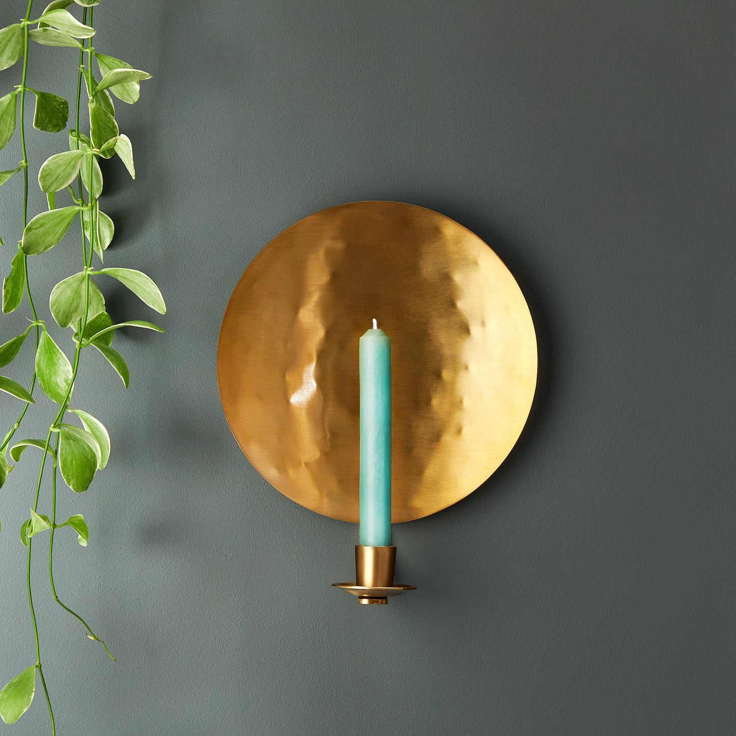 Celeste wall mounted candle holder in antique brass
