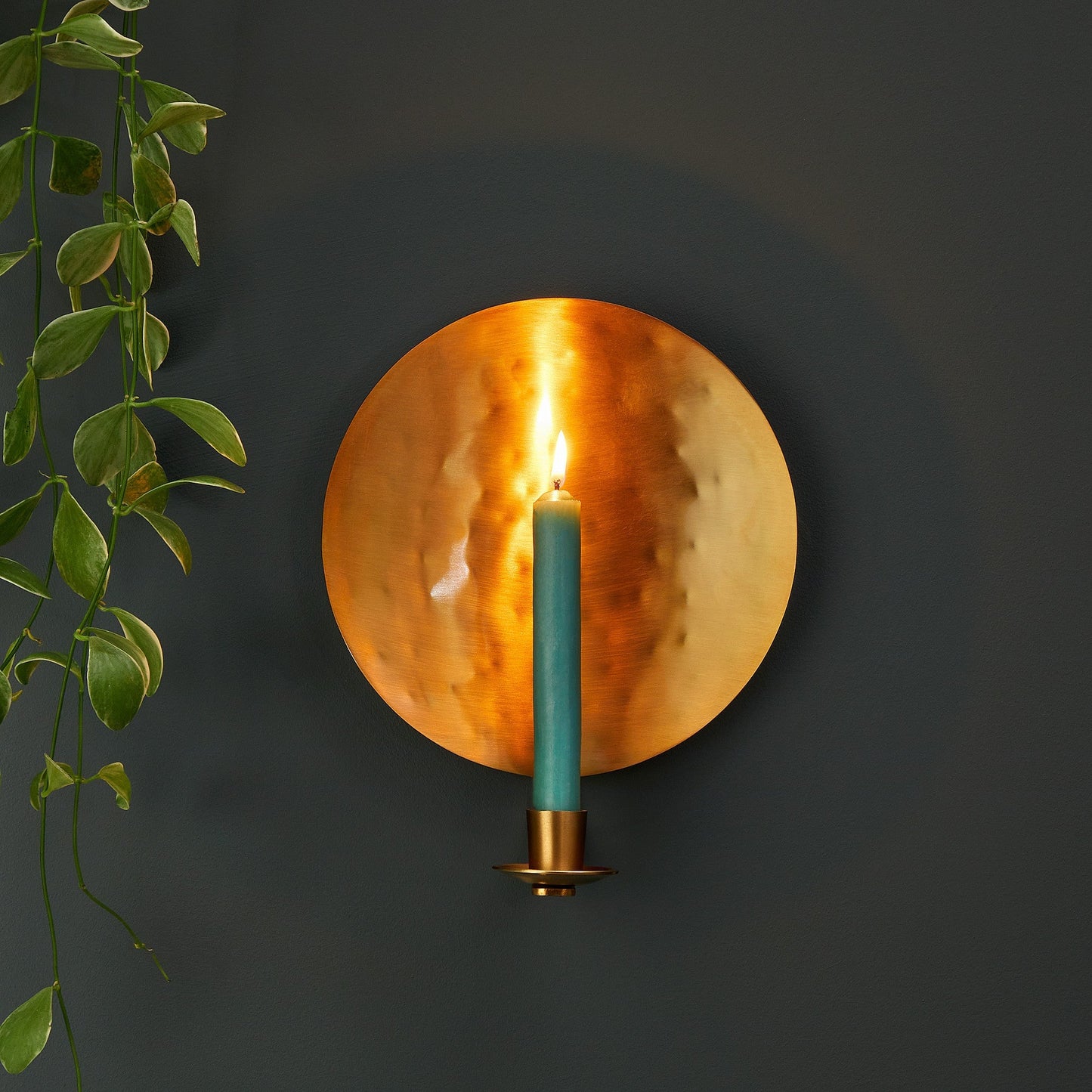 Celeste wall mounted candle holder in antique brass
