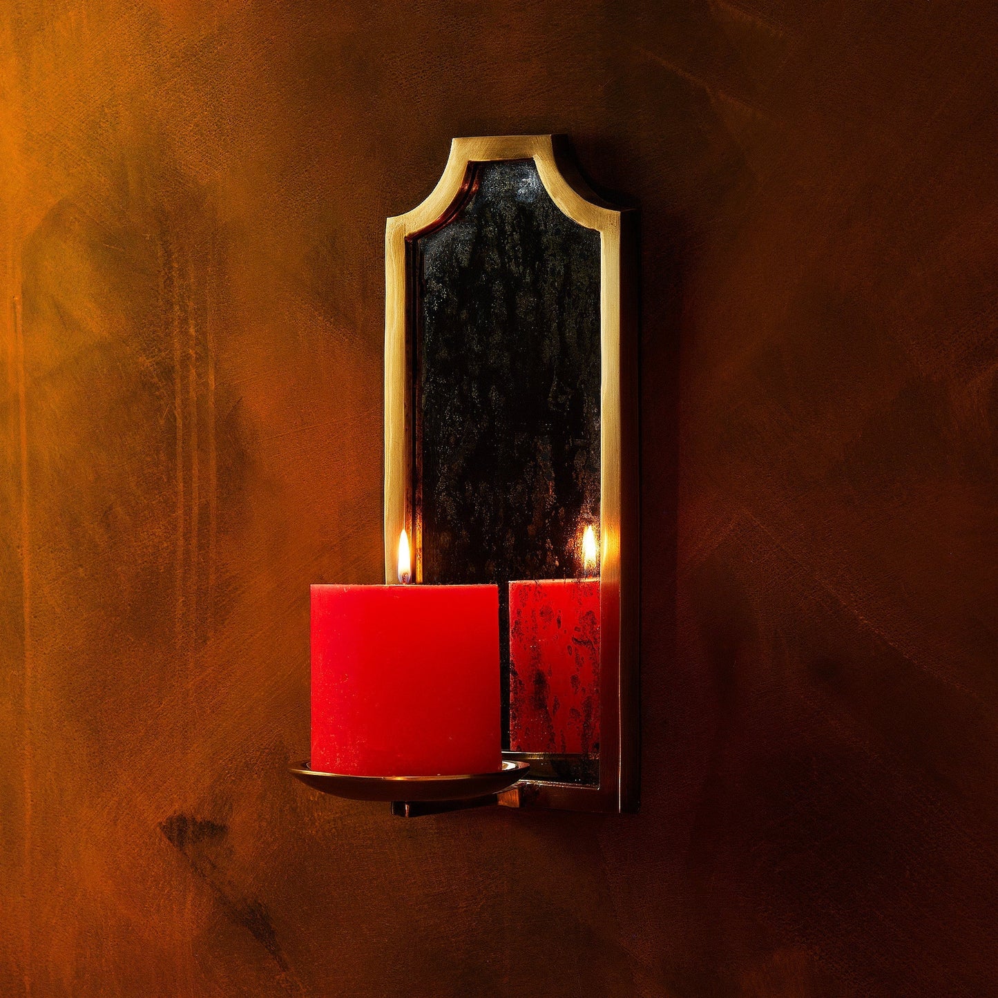 Kite wall mounted candle holder in antiqued brass