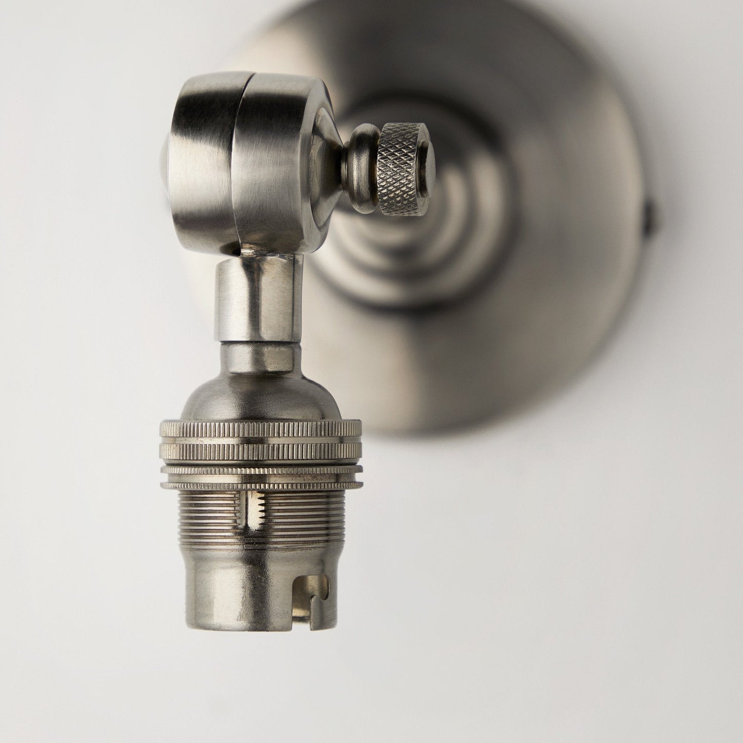 Elbow wall fitting in antiqued silver