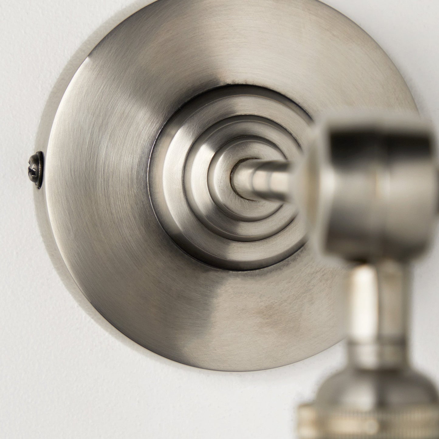 Elbow wall fitting in antiqued silver