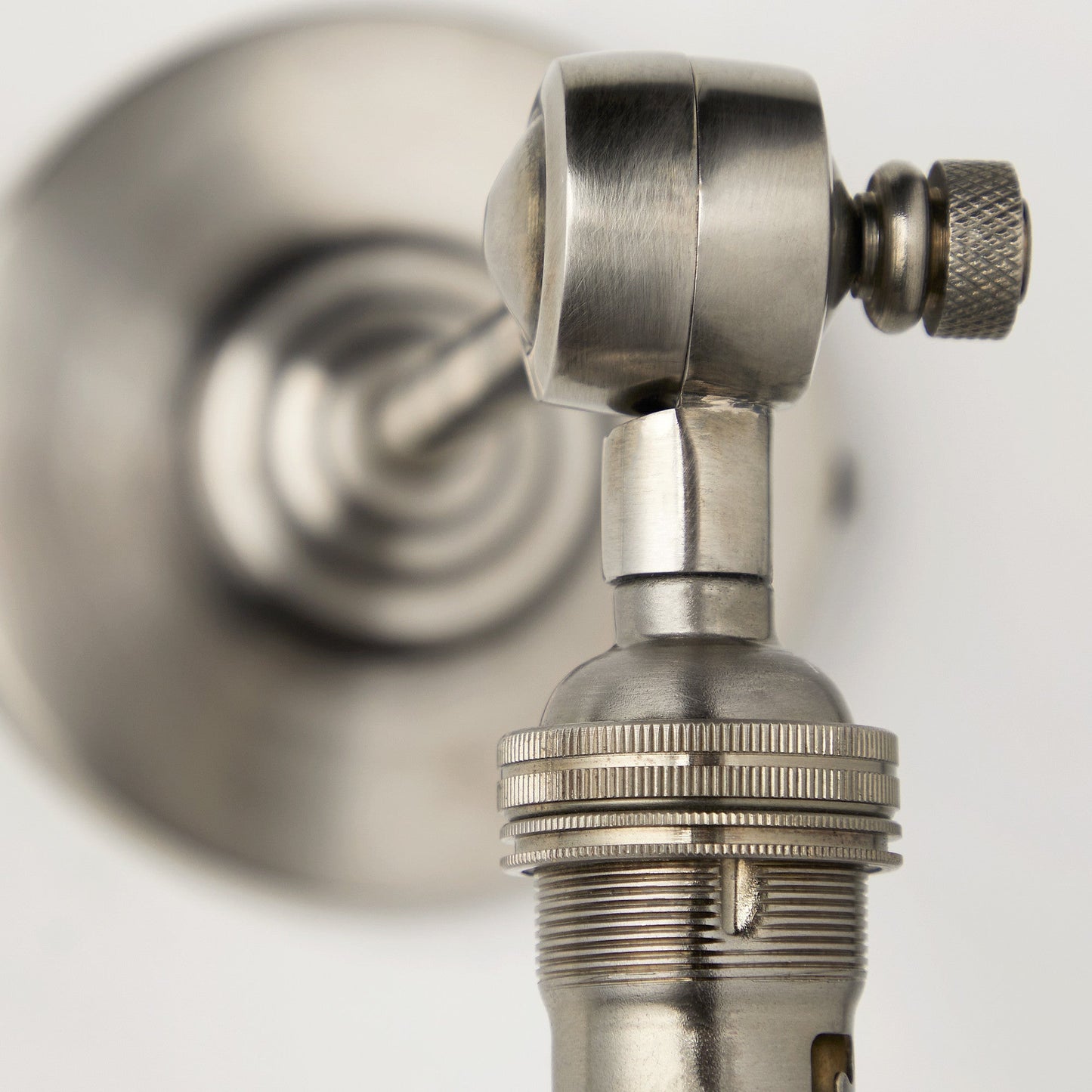 Elbow wall fitting in antiqued silver