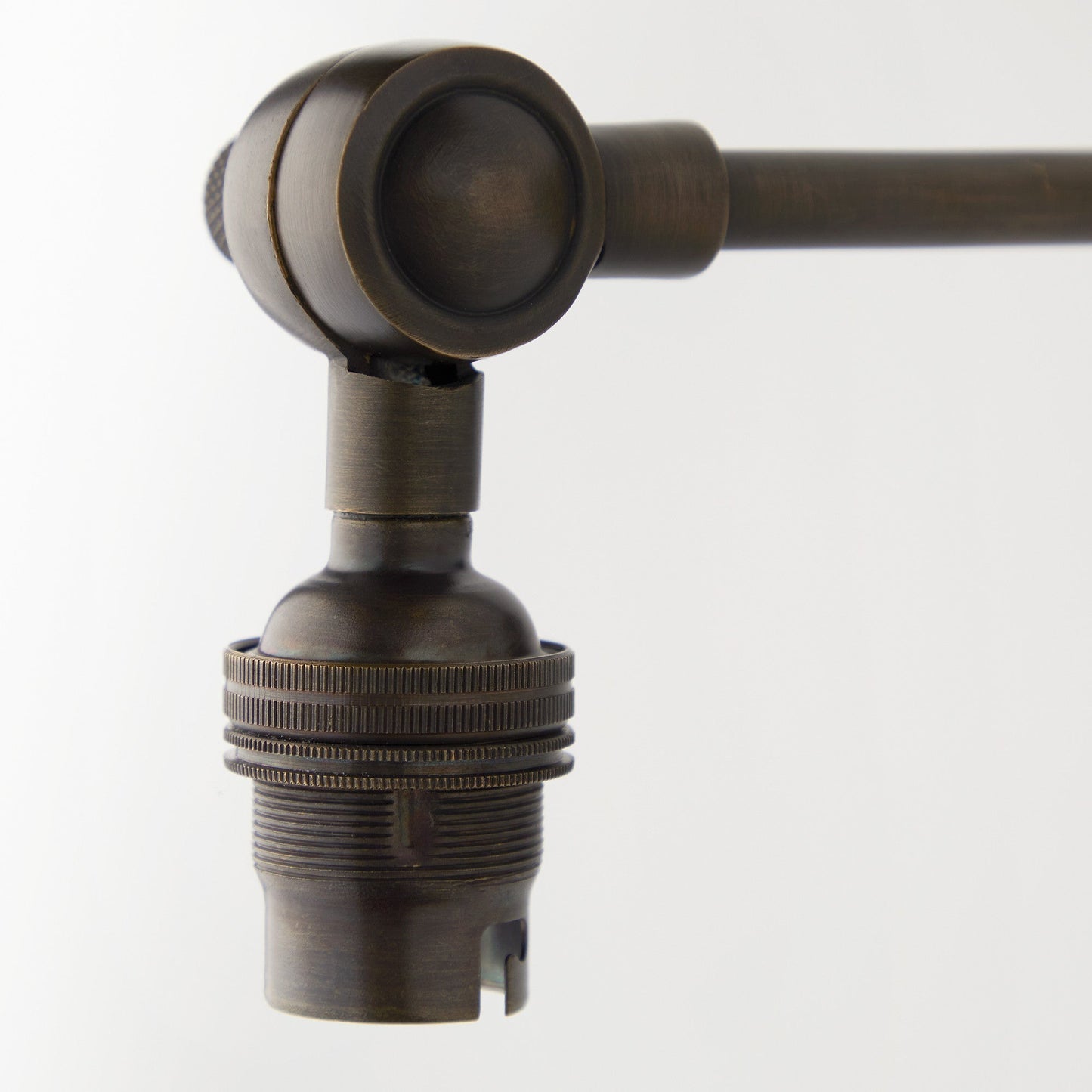 Elbow wall fitting in antiqued bronze