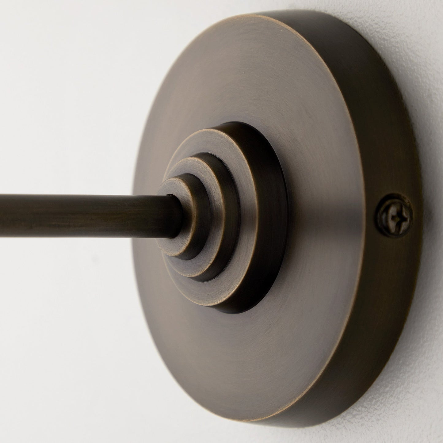 Elbow wall fitting in antiqued bronze