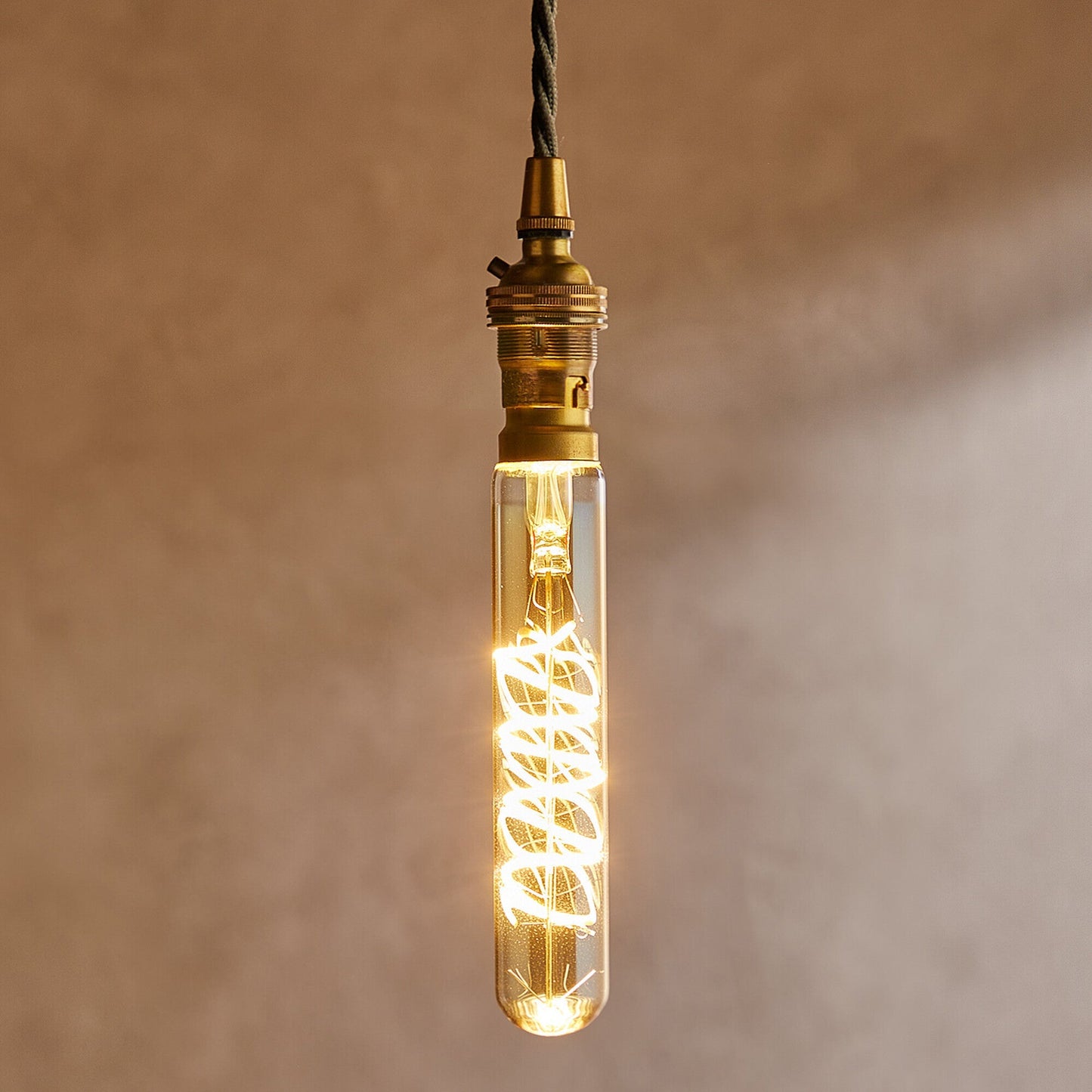 Long thin 4 watt LED curled filament bulb with amber coating and B22 fitting