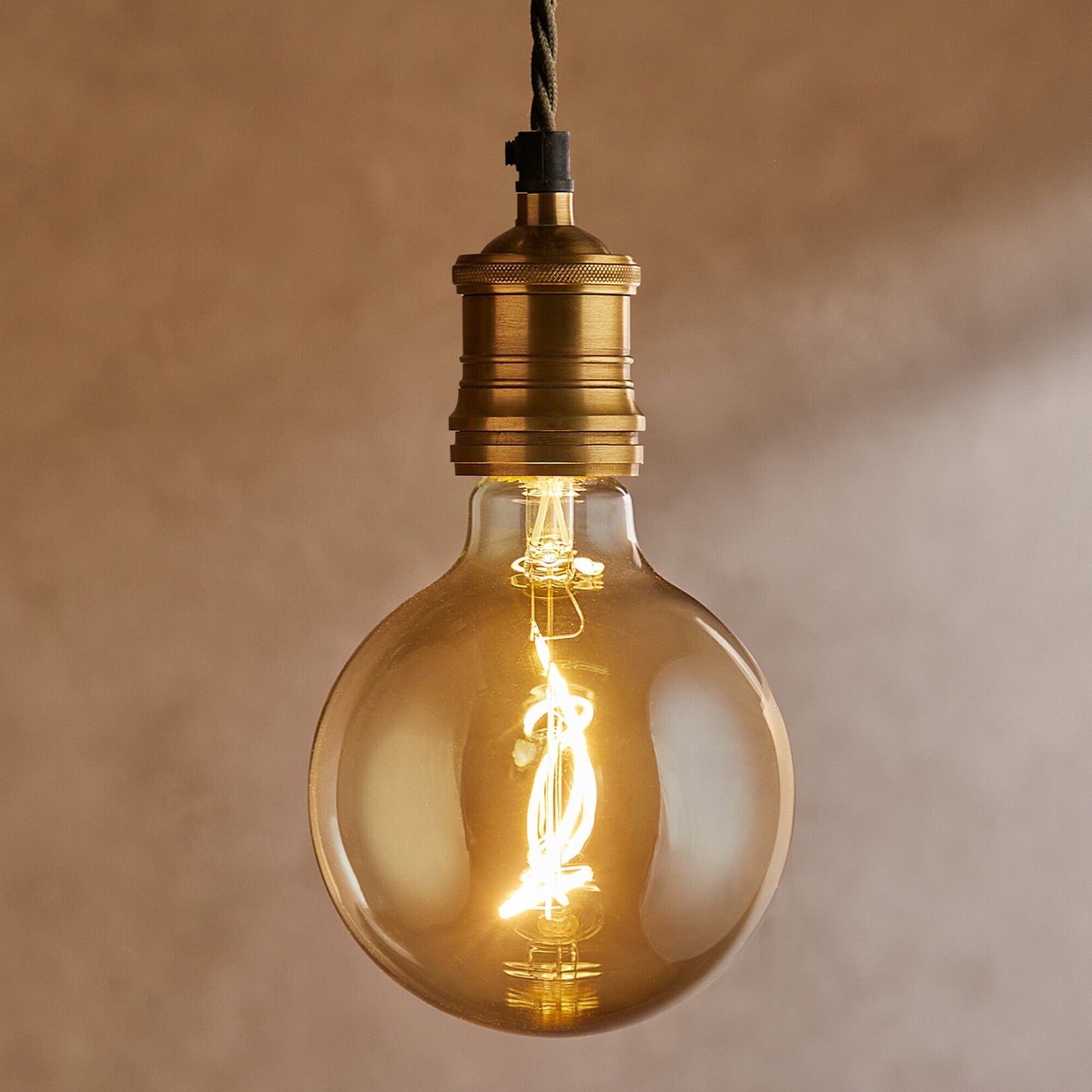 Extra Large globe 4 watt LED irregular filament bulb with amber coating and E27 fitting