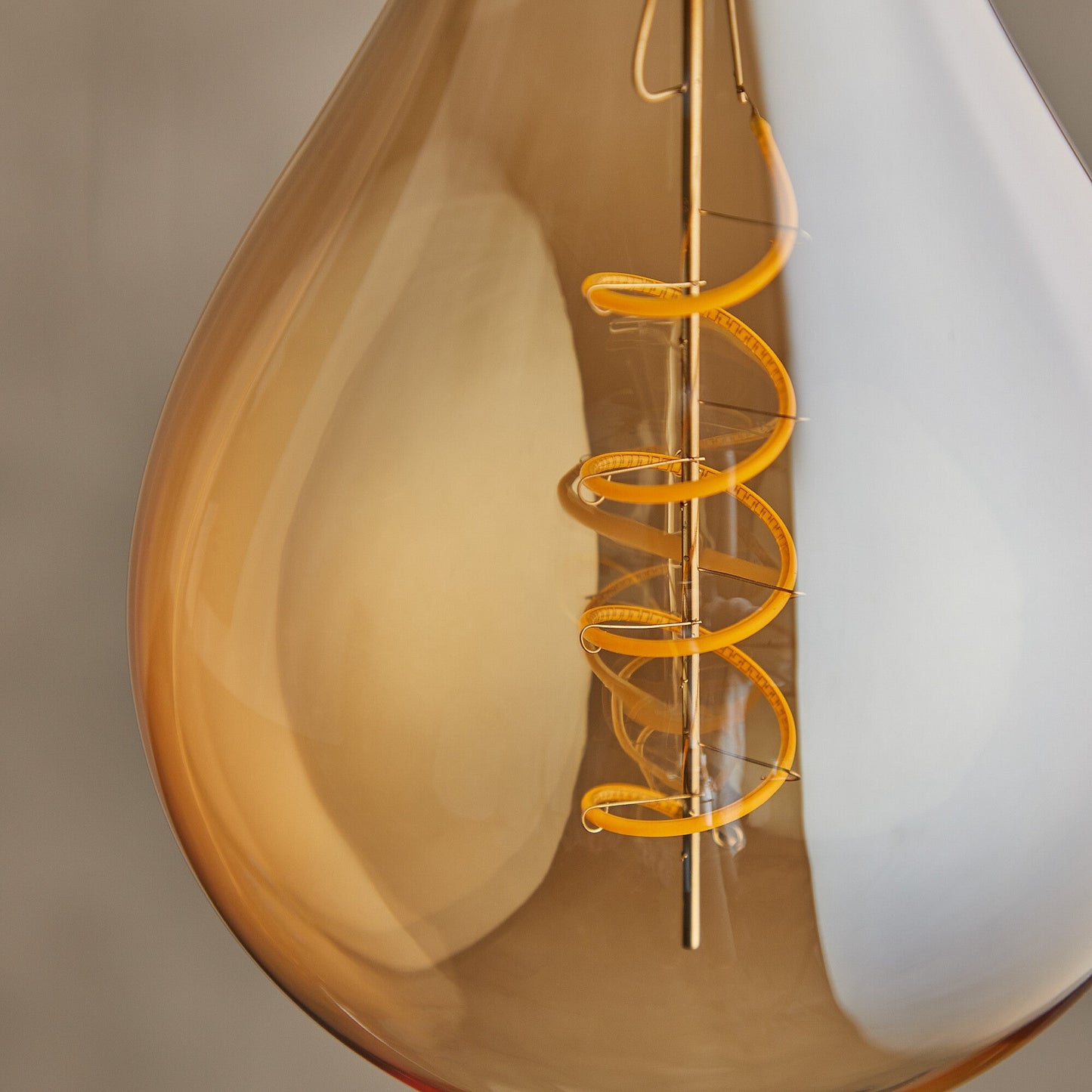 Giant 4 watt LED curled filament bulb with amber coating and E27 fitting