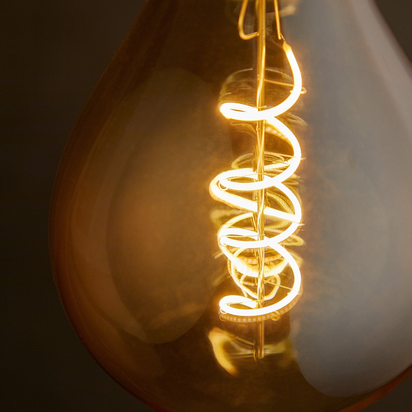 Giant 4 watt LED curled filament bulb with amber coating and E27 fitting