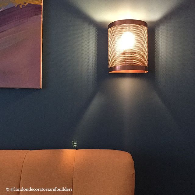 Scoville wall light in perforated brass