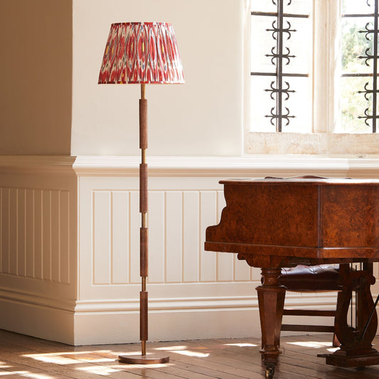 Skellig floor lamp in burnt wood and brass