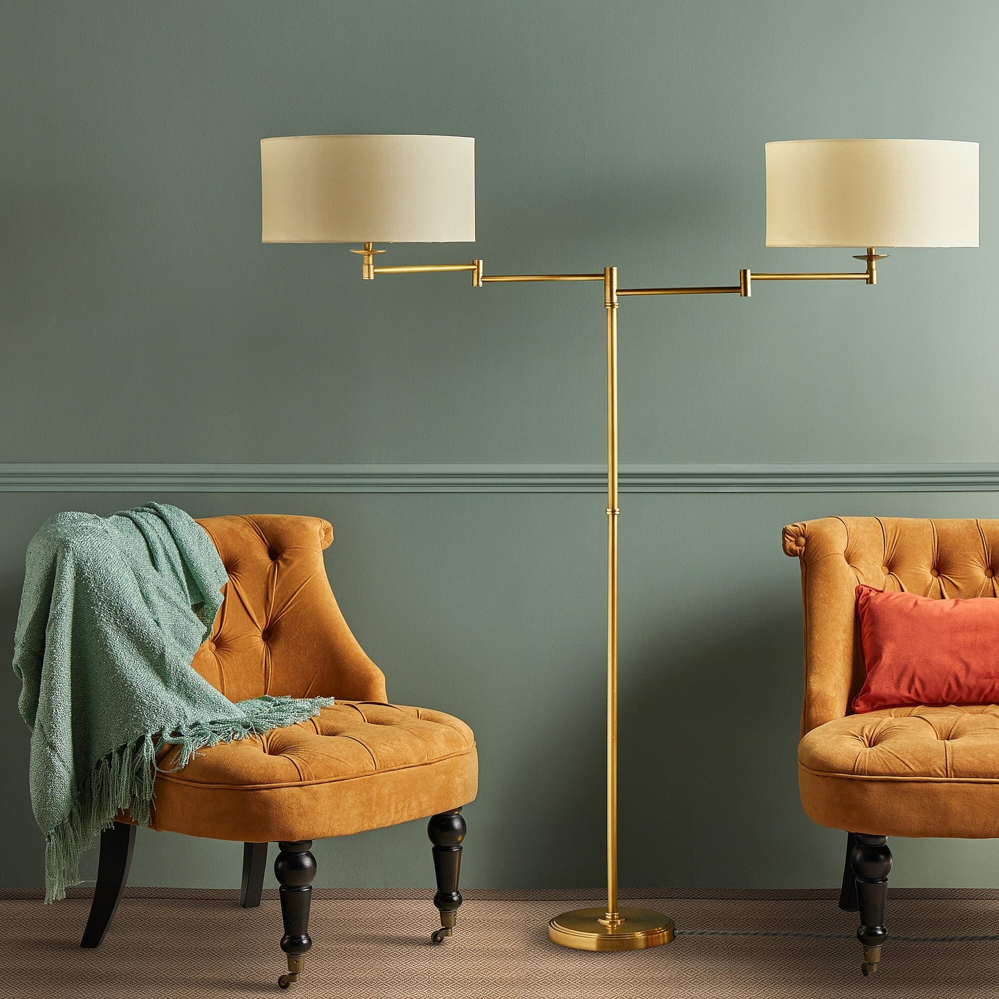 Double Swing standing lamp in antique brass