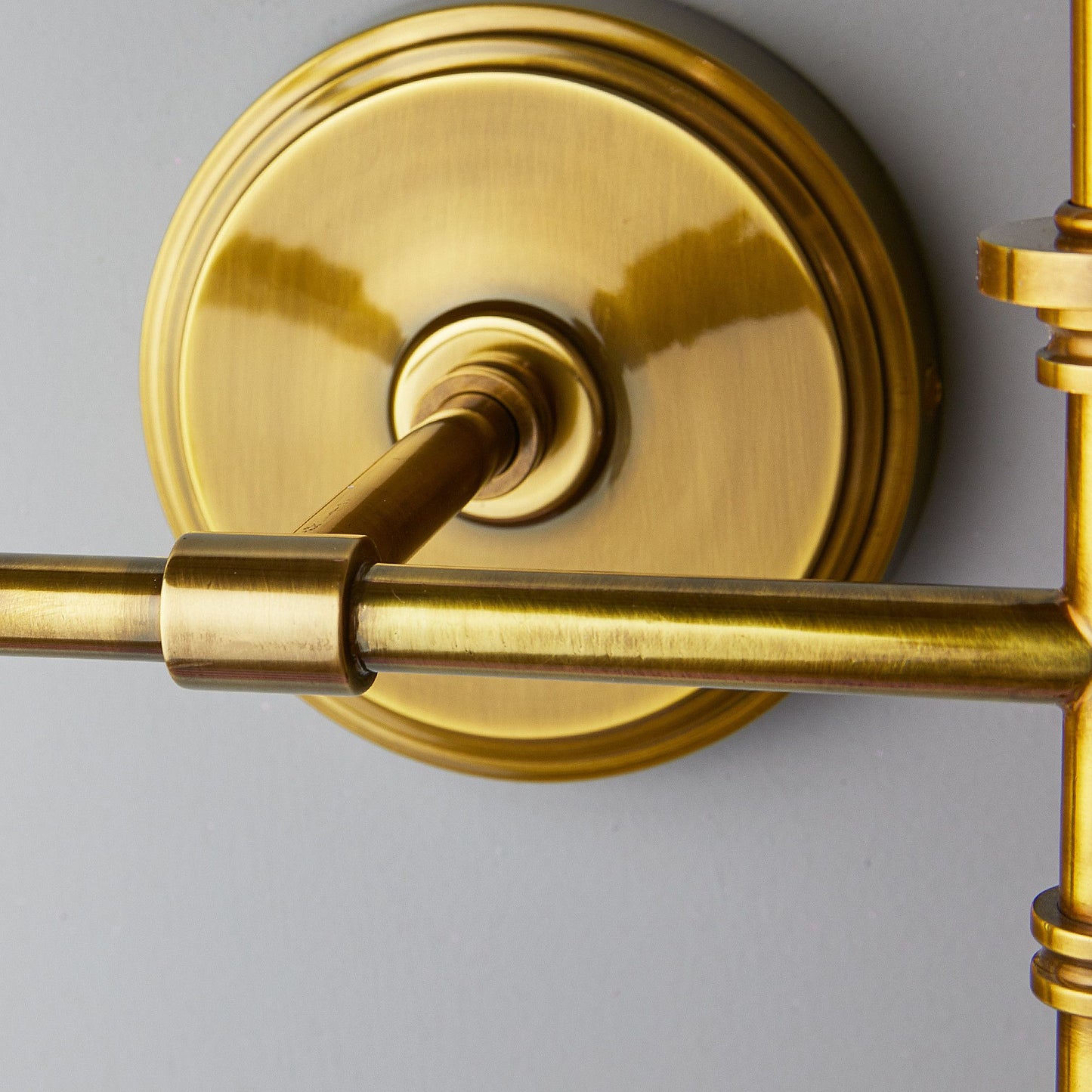 Double Chukka Wall fitting in antiqued brass