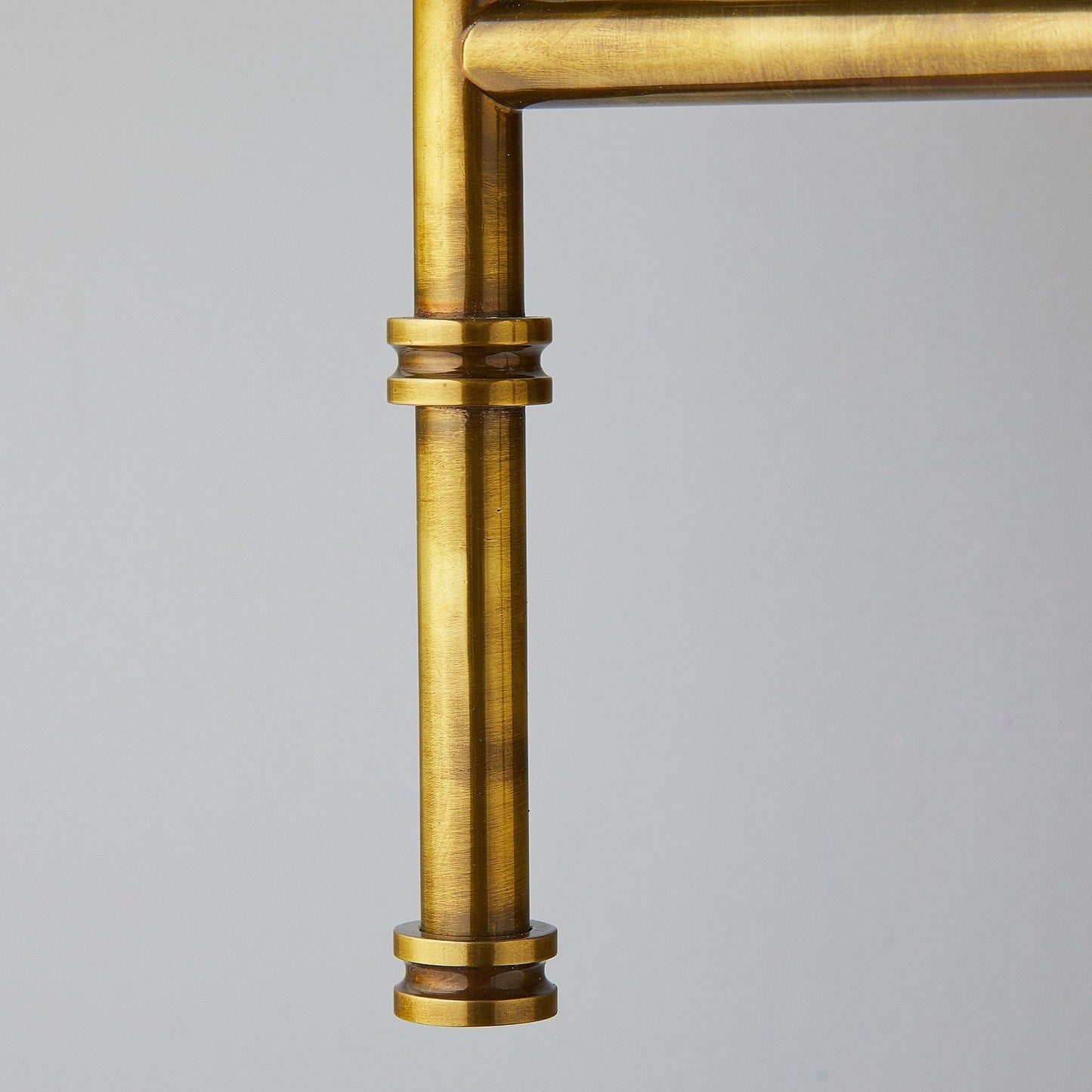 Double Chukka Wall fitting in antiqued brass