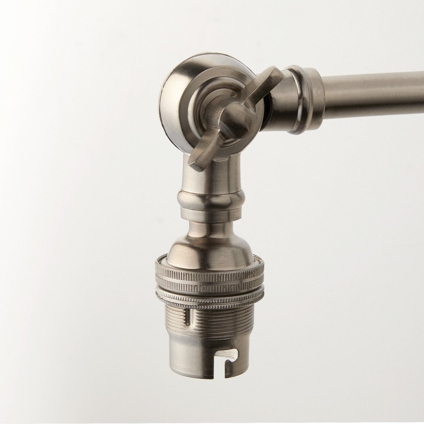 Double jointed wall fitting in antiqued silver
