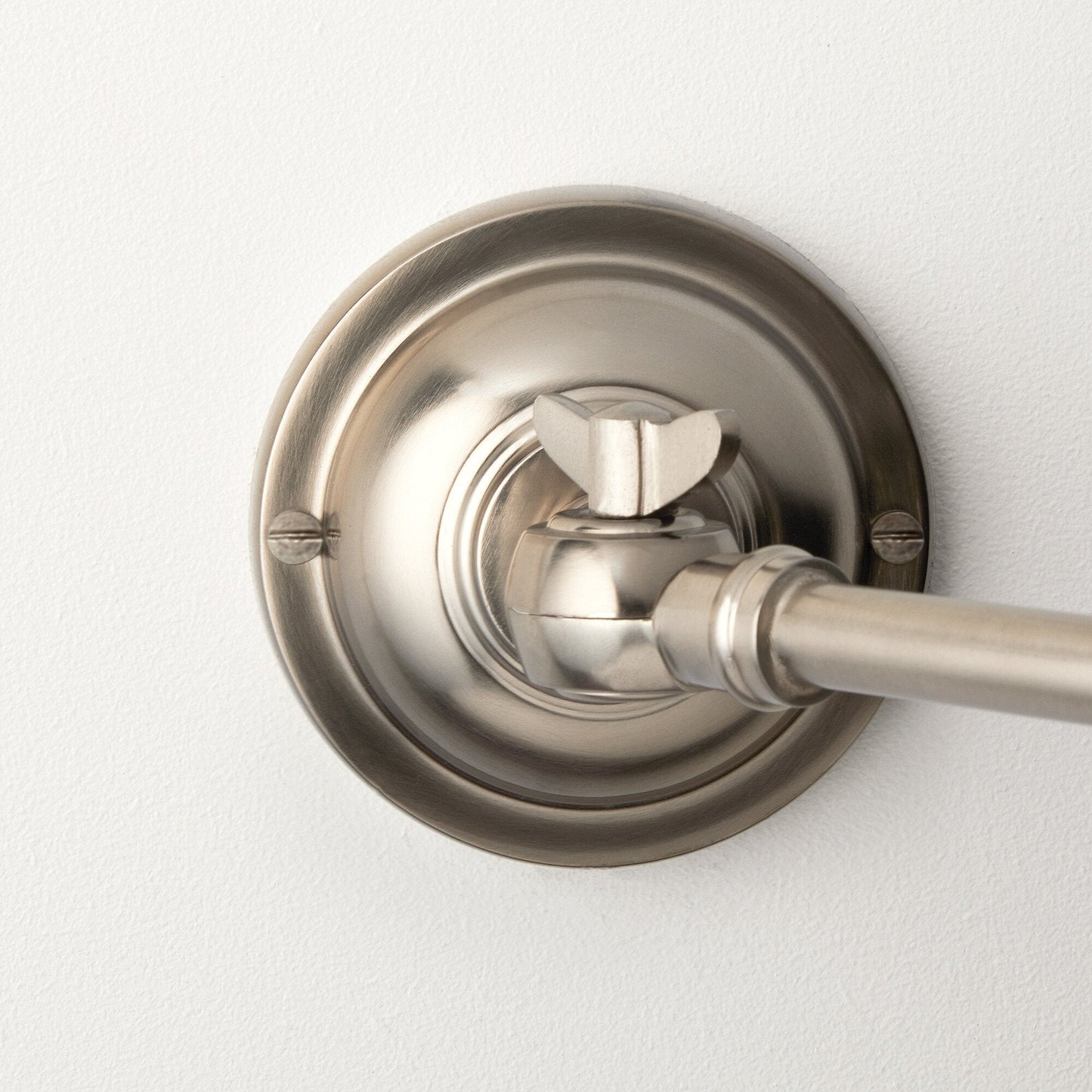 Double jointed wall fitting in antiqued silver