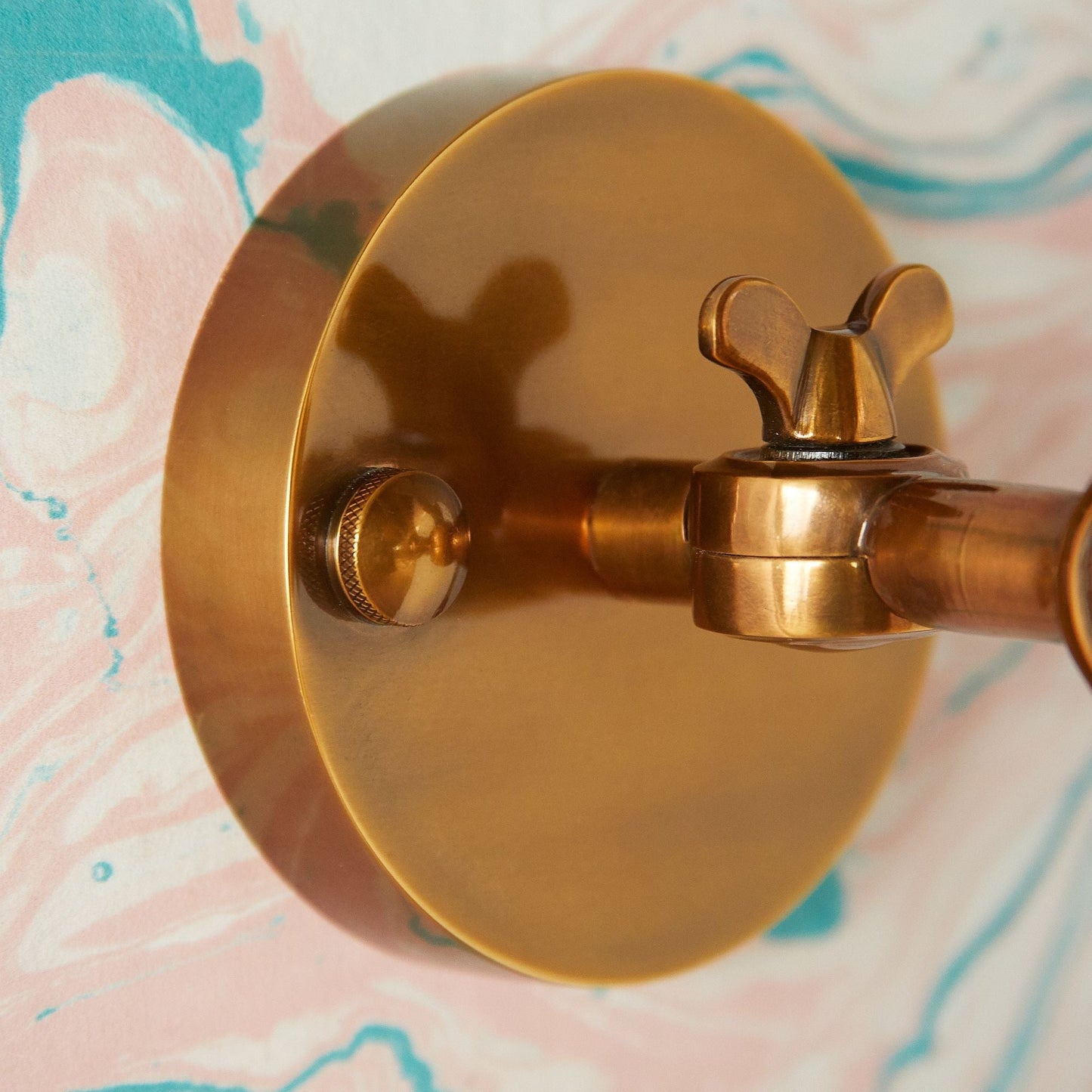 Jasmine Wall Light in Antiqued Brass