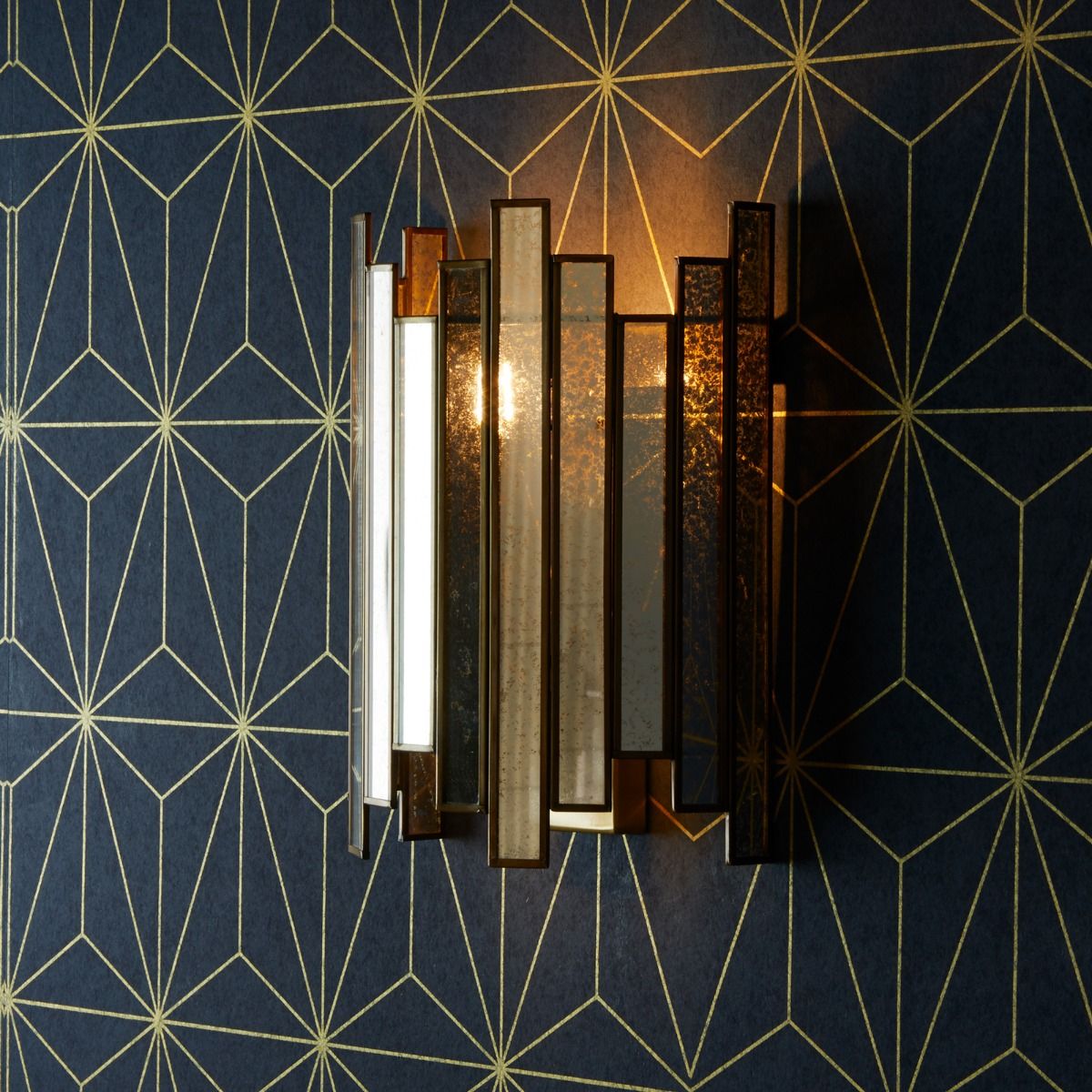 Melville wall sconce in mercurised glass