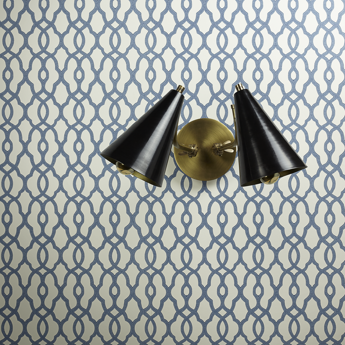 Mo double wall light in brass with a black hood