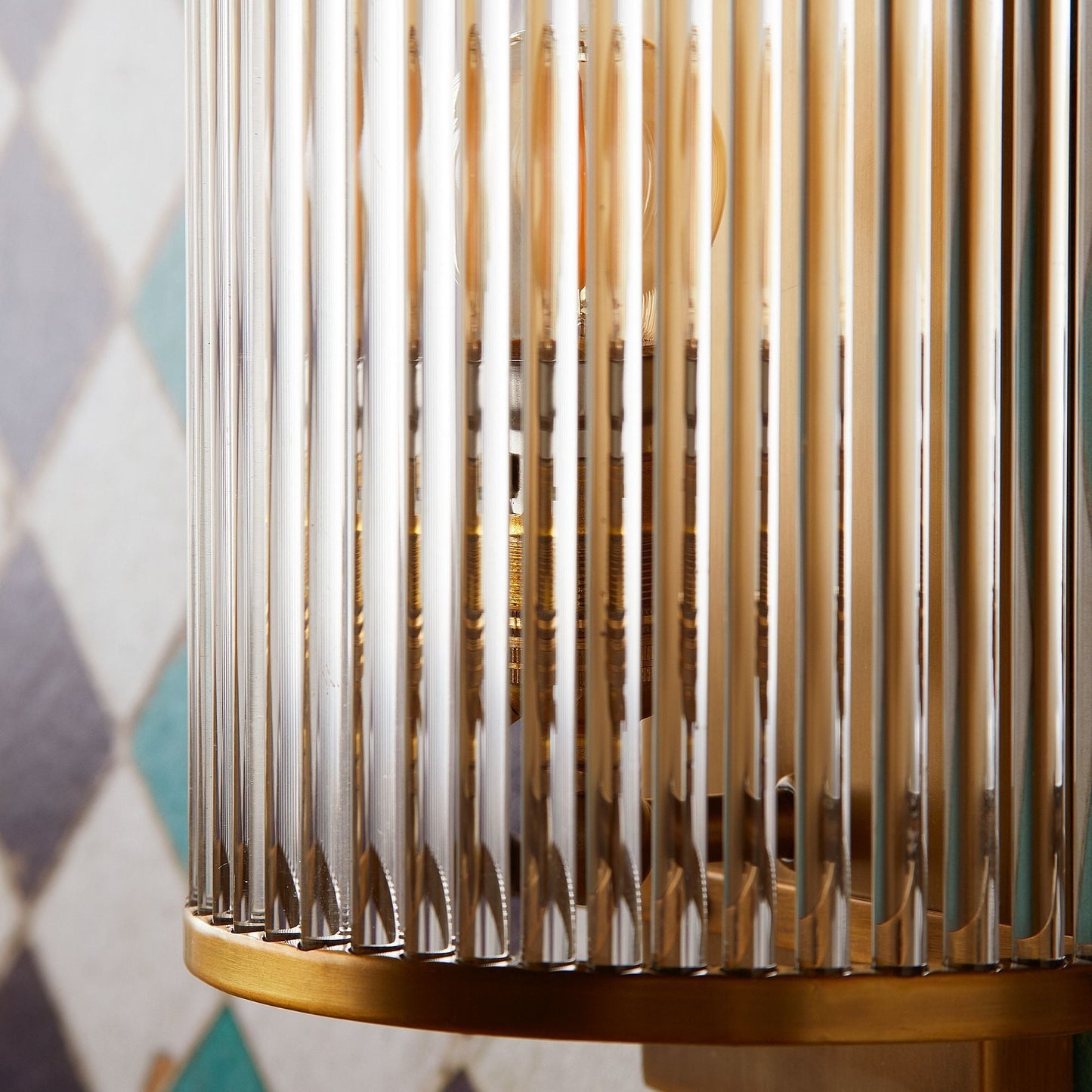 Roddy wall light in brass with glass rods