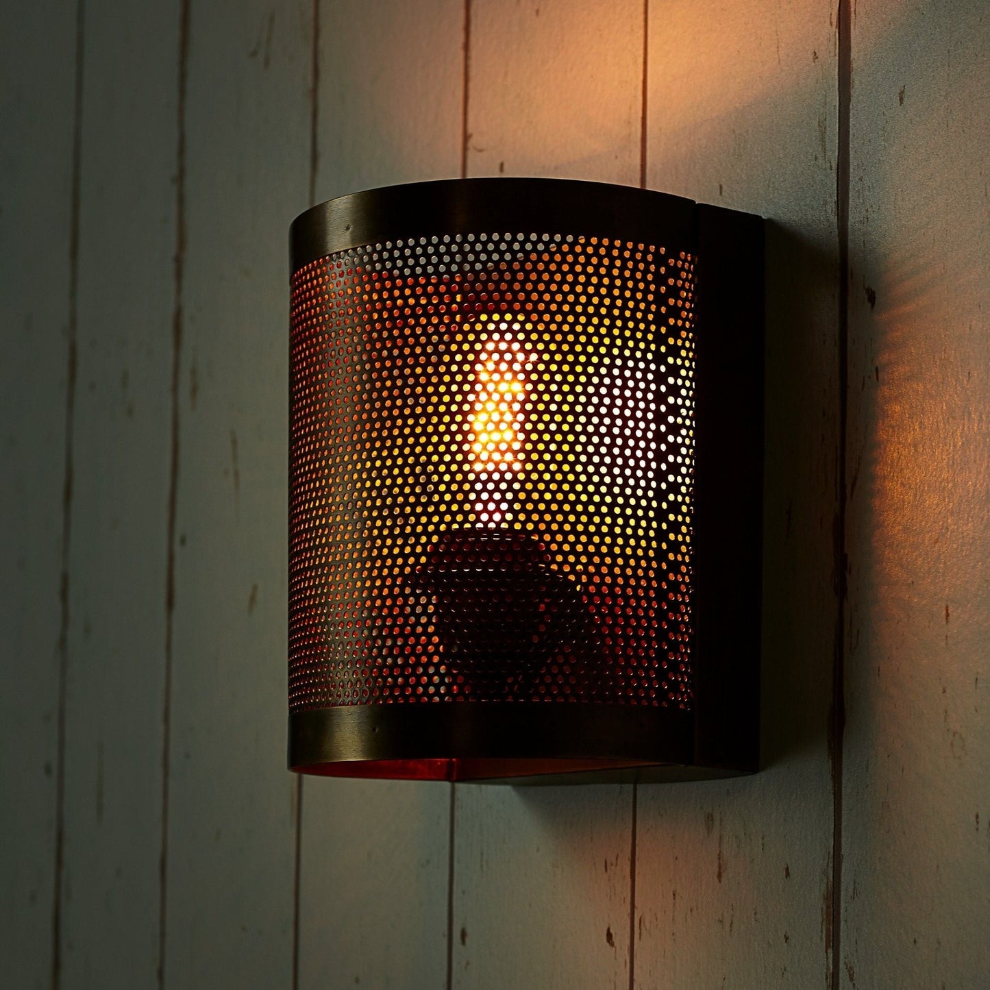 Scoville wall light in perforated brass
